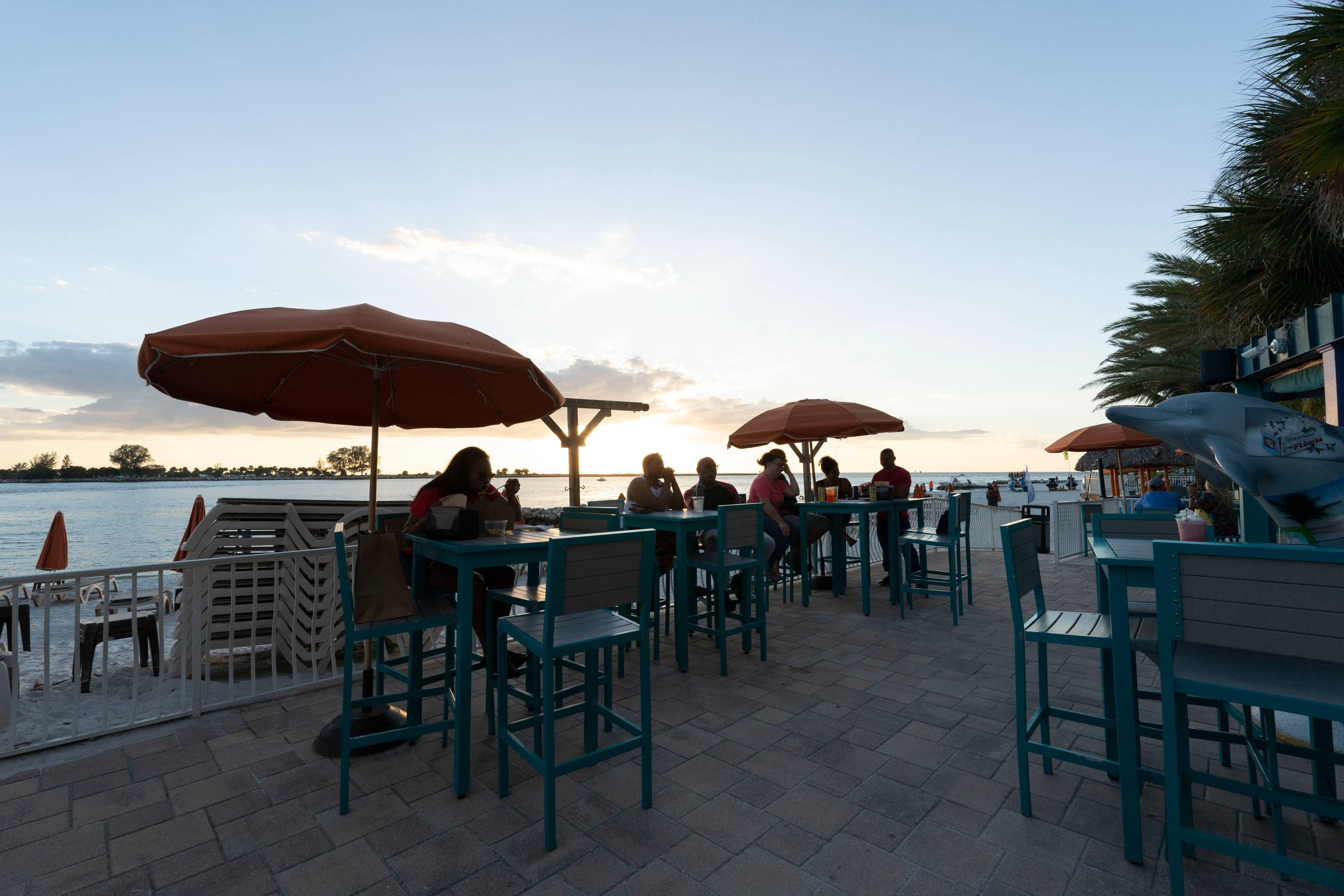 On-site restaurant | Winter the Dolphins Beach Club, Ascend Hotel Collection