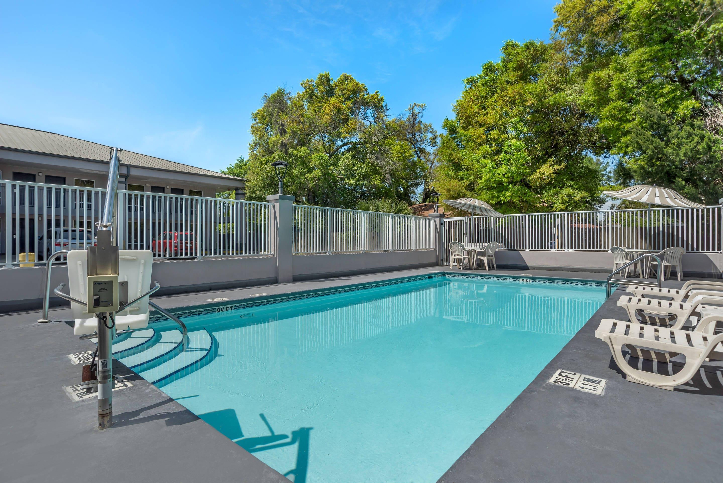 Outdoor pool | Quality Inn & Suites near Panama City Beach