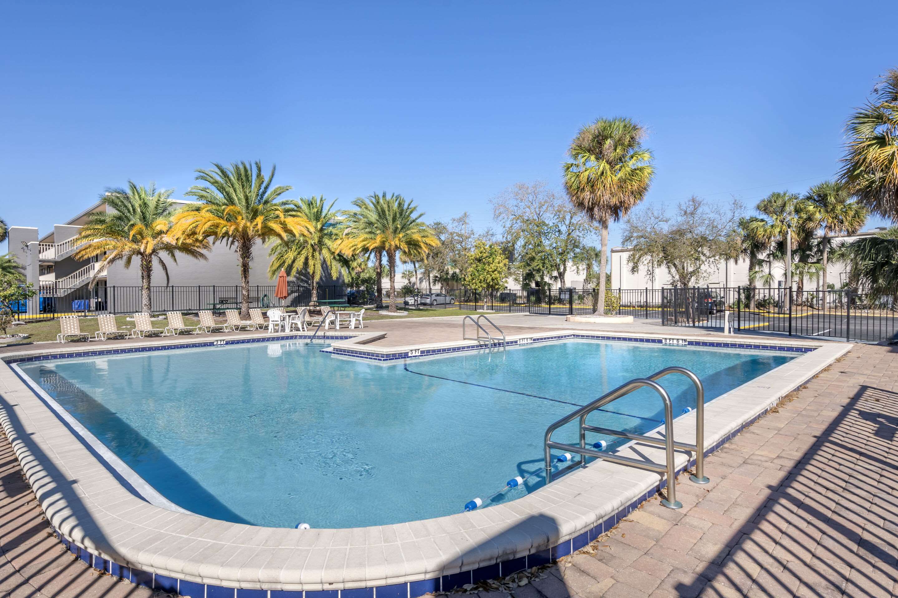 Outdoor pool | Suburban Studios International Drive