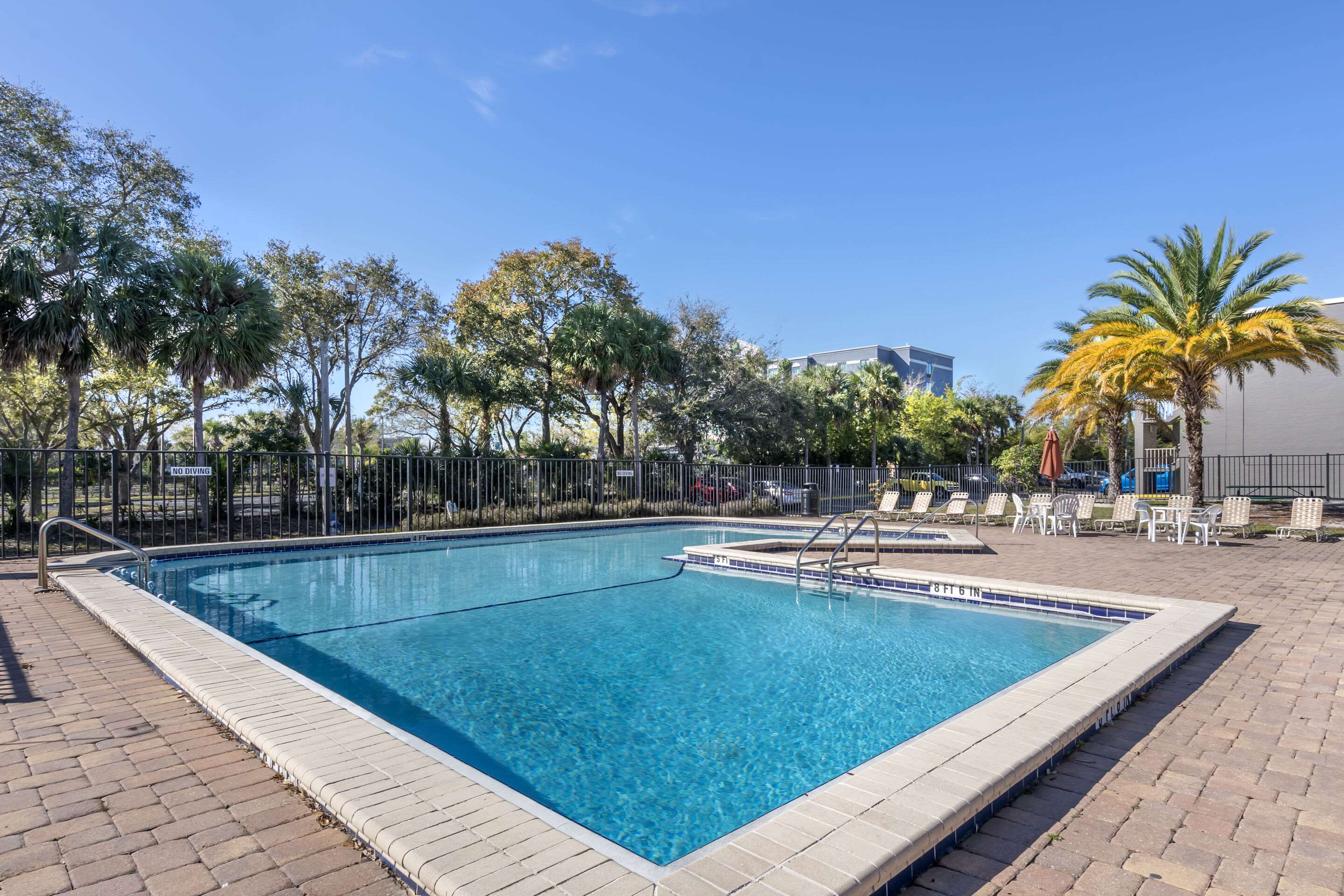 Outdoor pool | Suburban Studios International Drive