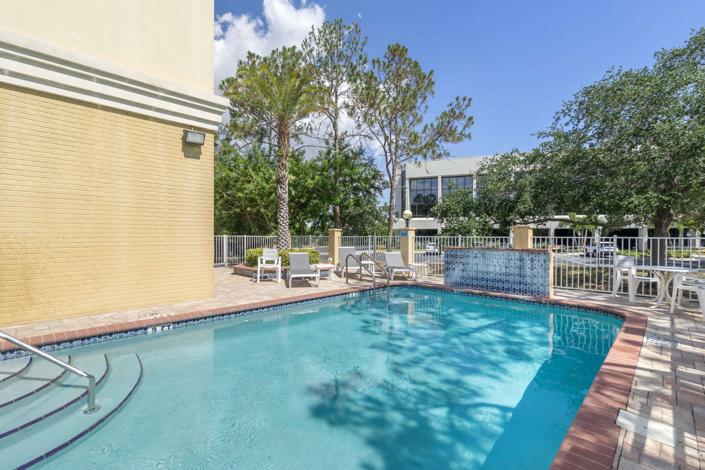 Outdoor pool | Comfort Inn & Suites Northeast - Gateway