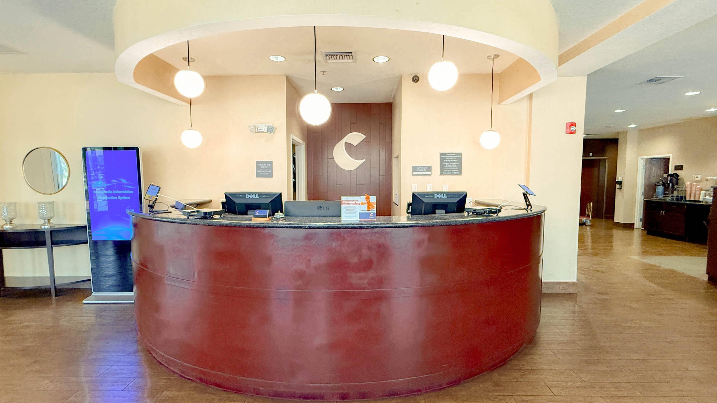 Front desk | Comfort Suites Orlando Airport