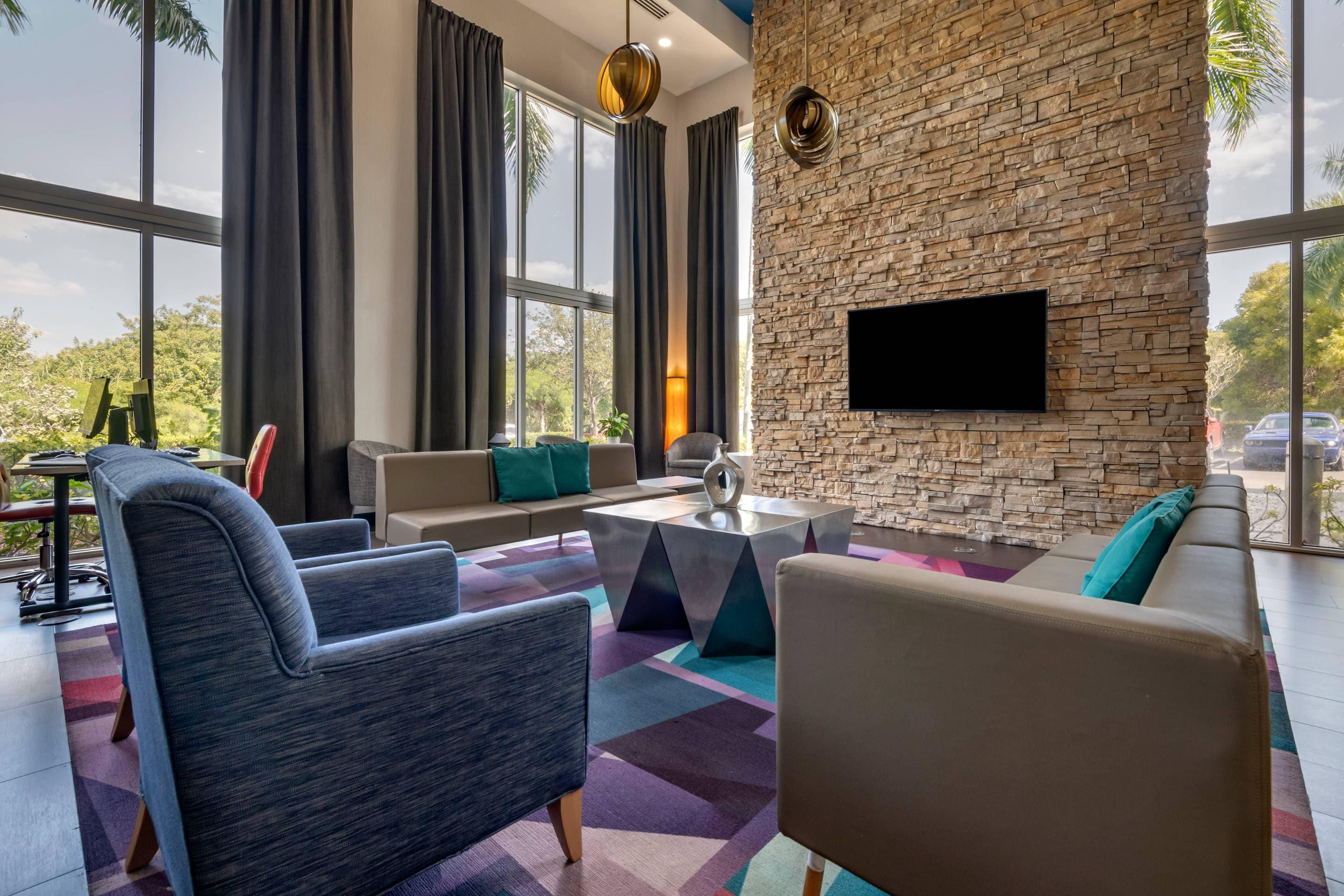 Lobby with sitting area | Cambria Hotel Ft Lauderdale, Airport South & Cruise Port