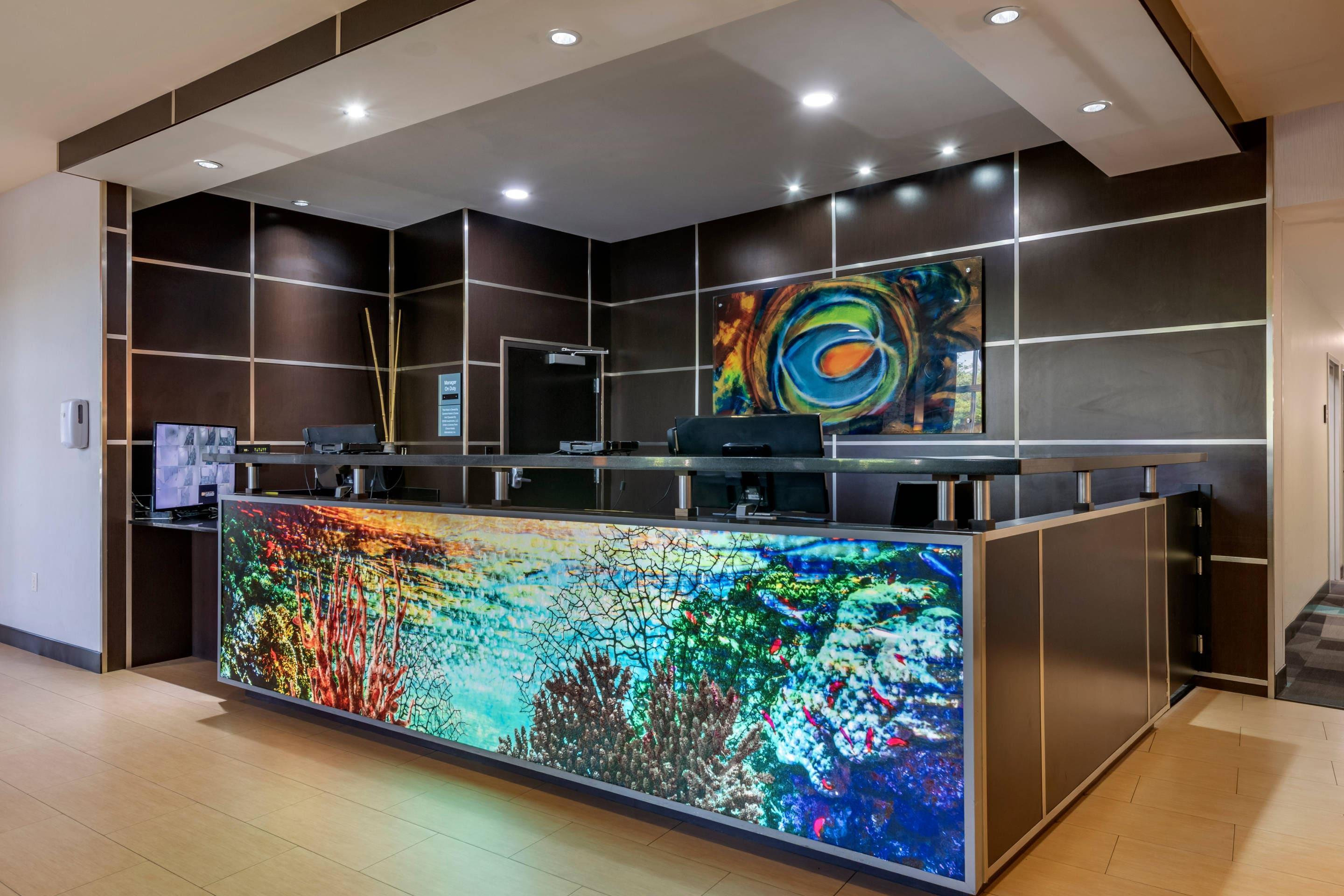 Front desk with friendly staff | Cambria Hotel Ft Lauderdale, Airport South & Cruise Port