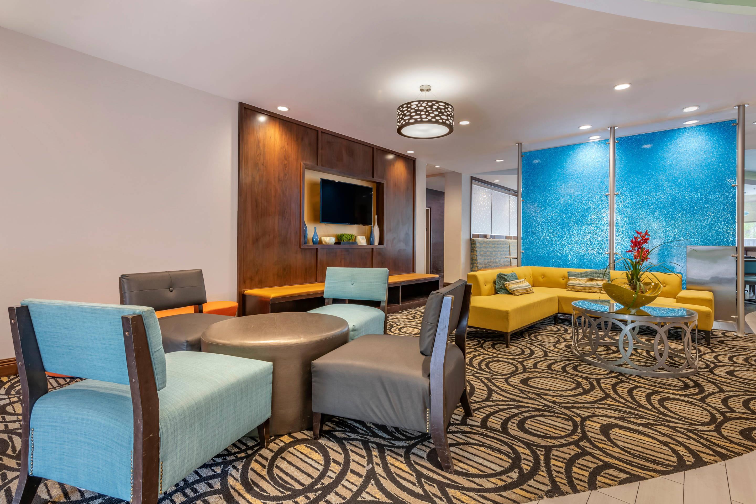 Spacious lobby with sitting area | Comfort Suites Fort Lauderdale Airport South & Cruise Port