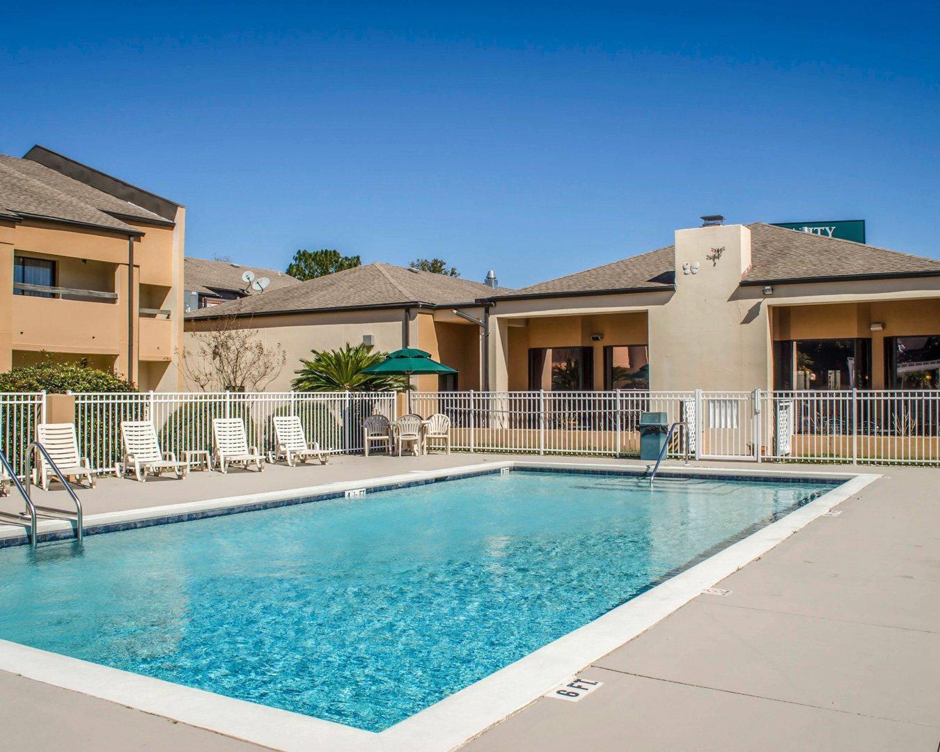 Outdoor pool | Quality Inn & Suites Pensacola Bayview