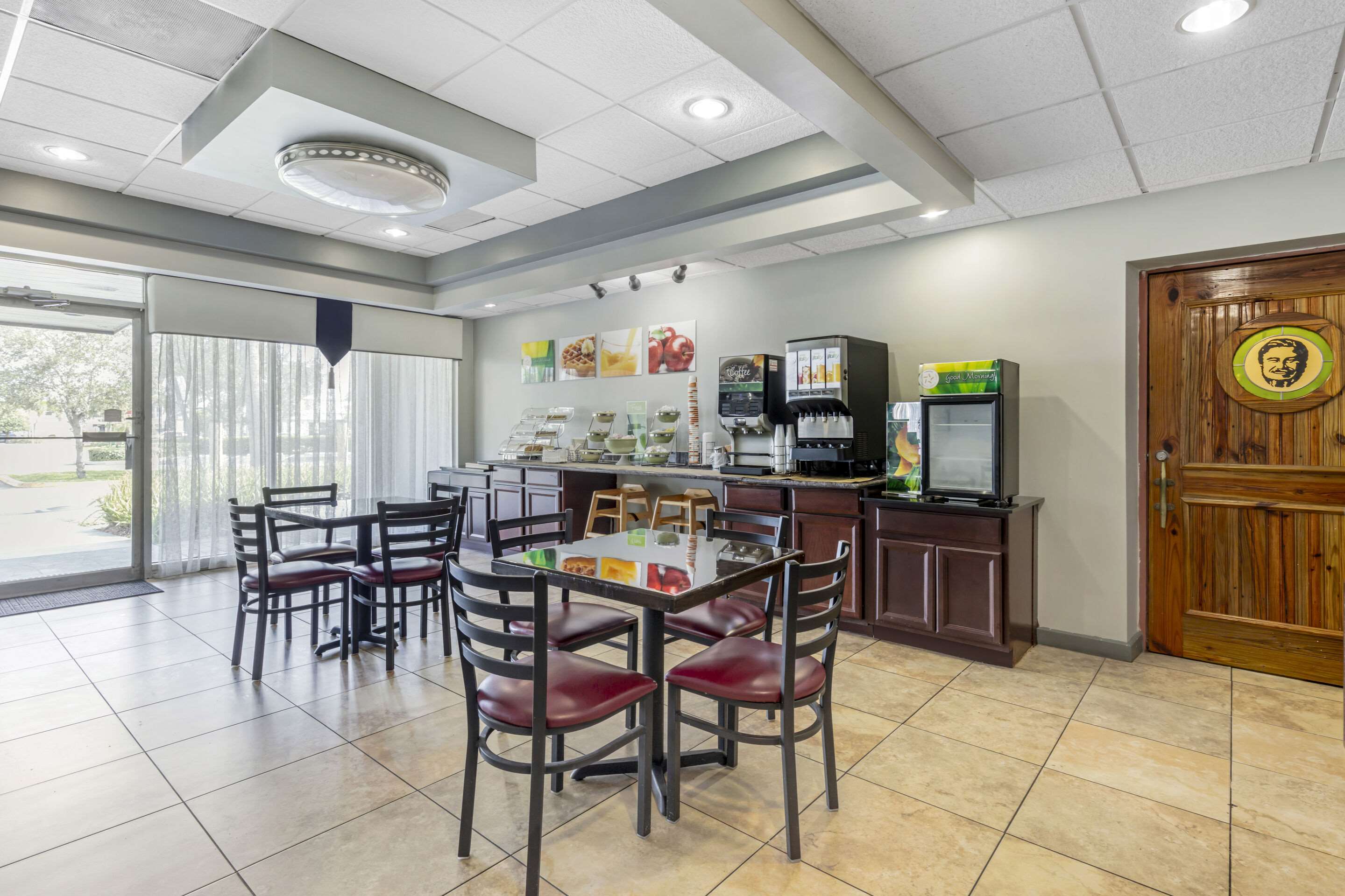 Enjoy breakfast in this seating area | Quality Inn Downtown Stuart