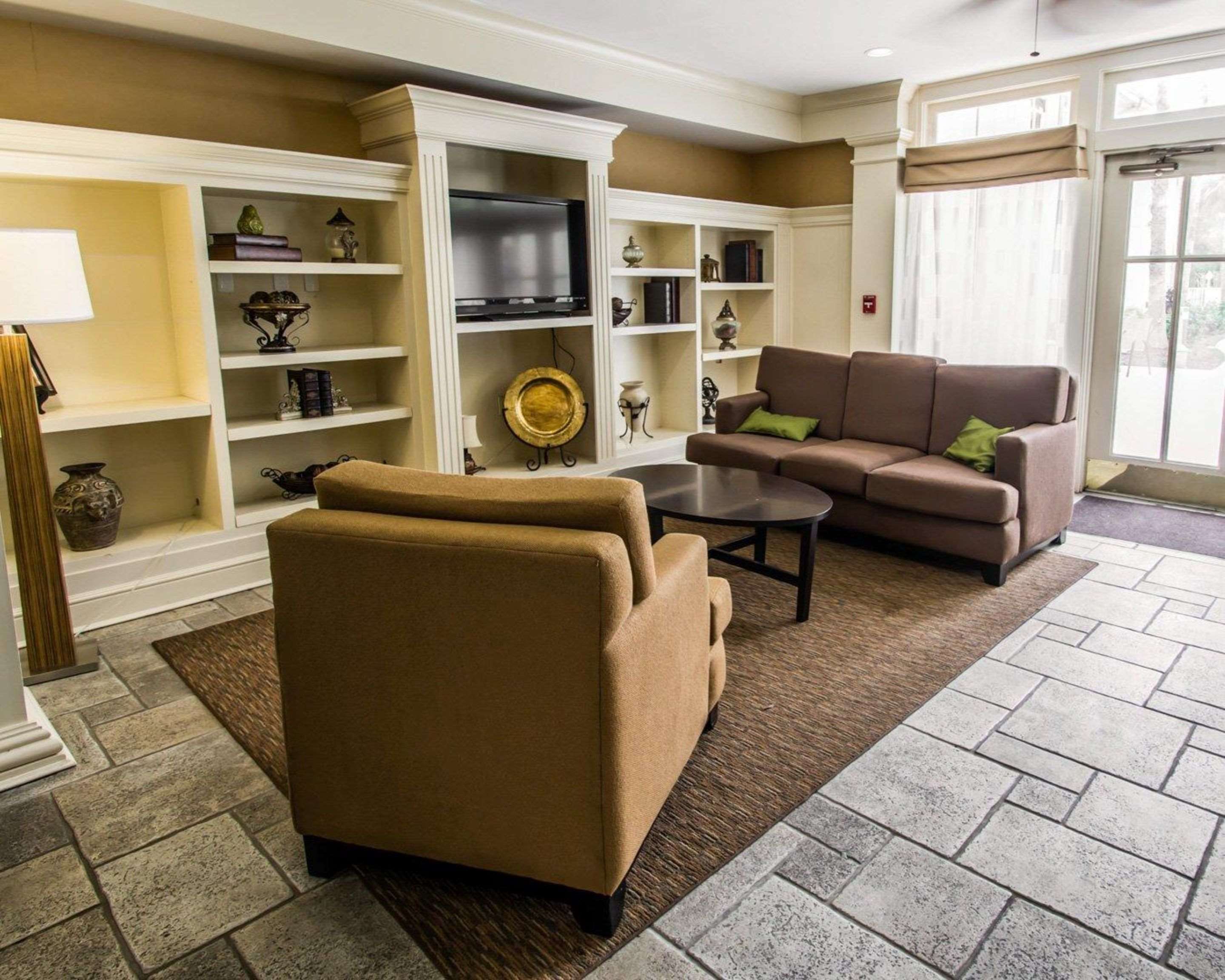 Spacious lobby with sitting area | Sleep Inn at PGA Village