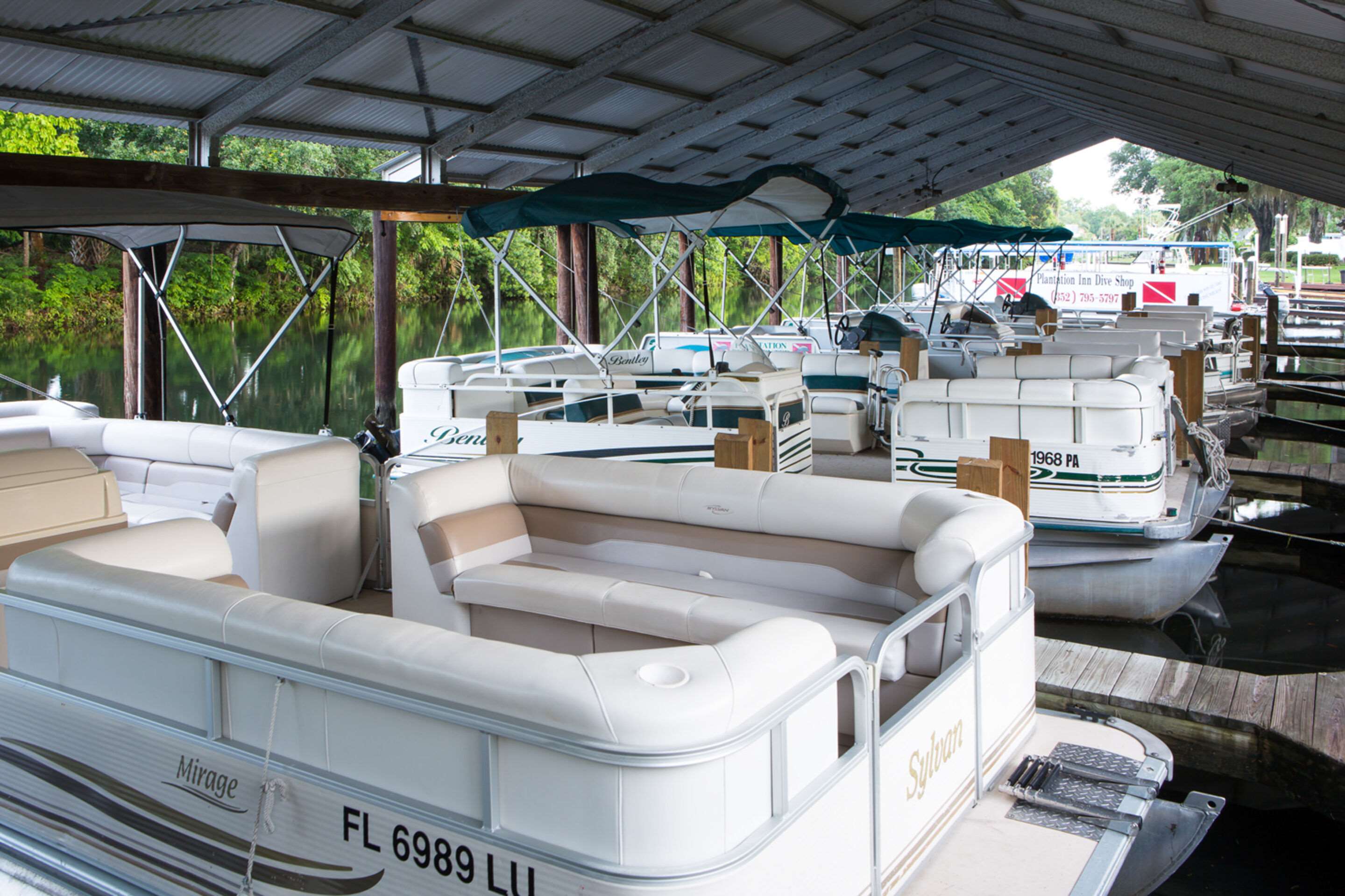 Boats | Plantation on Crystal River, Ascend Hotel Collection
