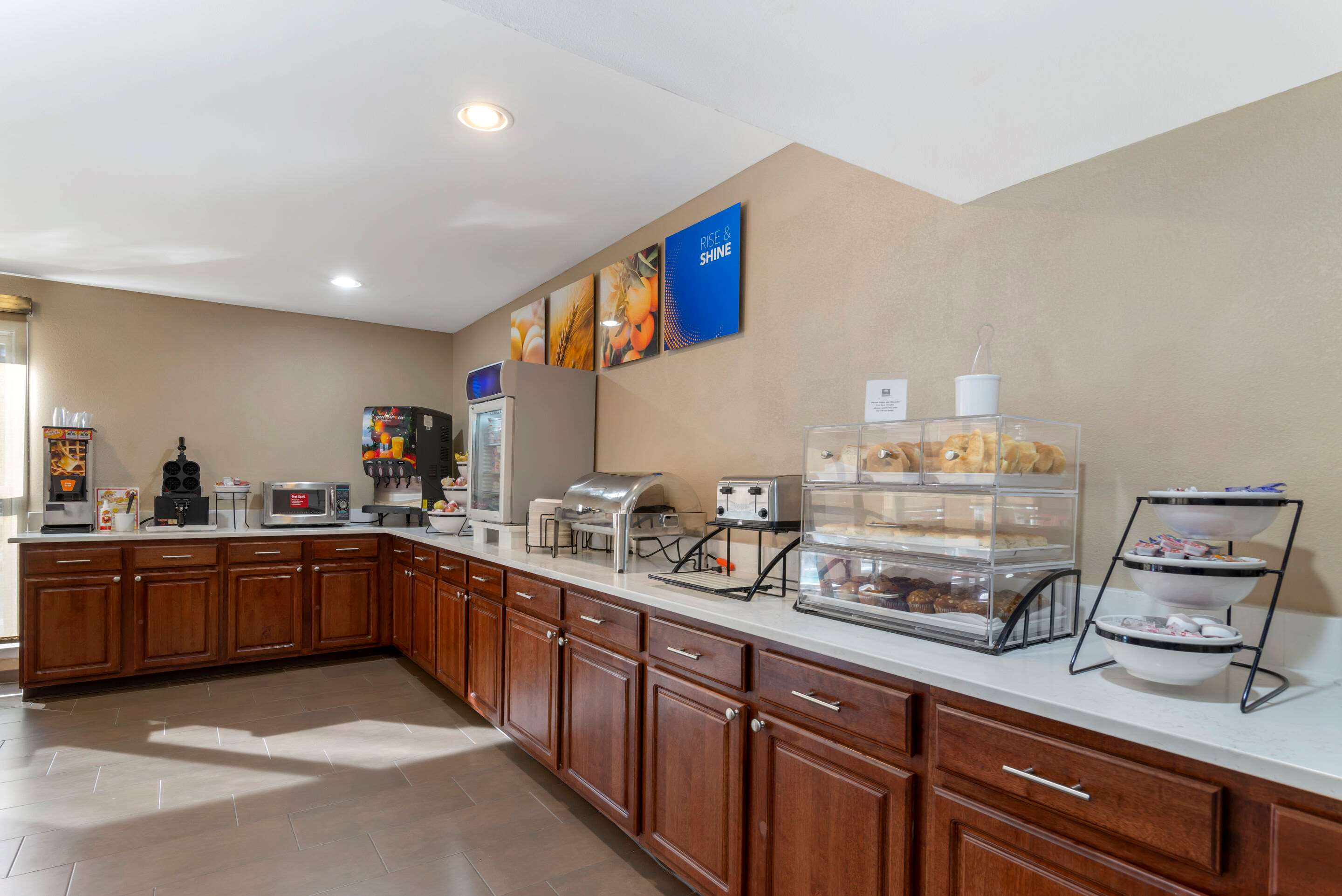 Breakfast area | Comfort Inn & Suites - near Robins Air Force Base Main Gate