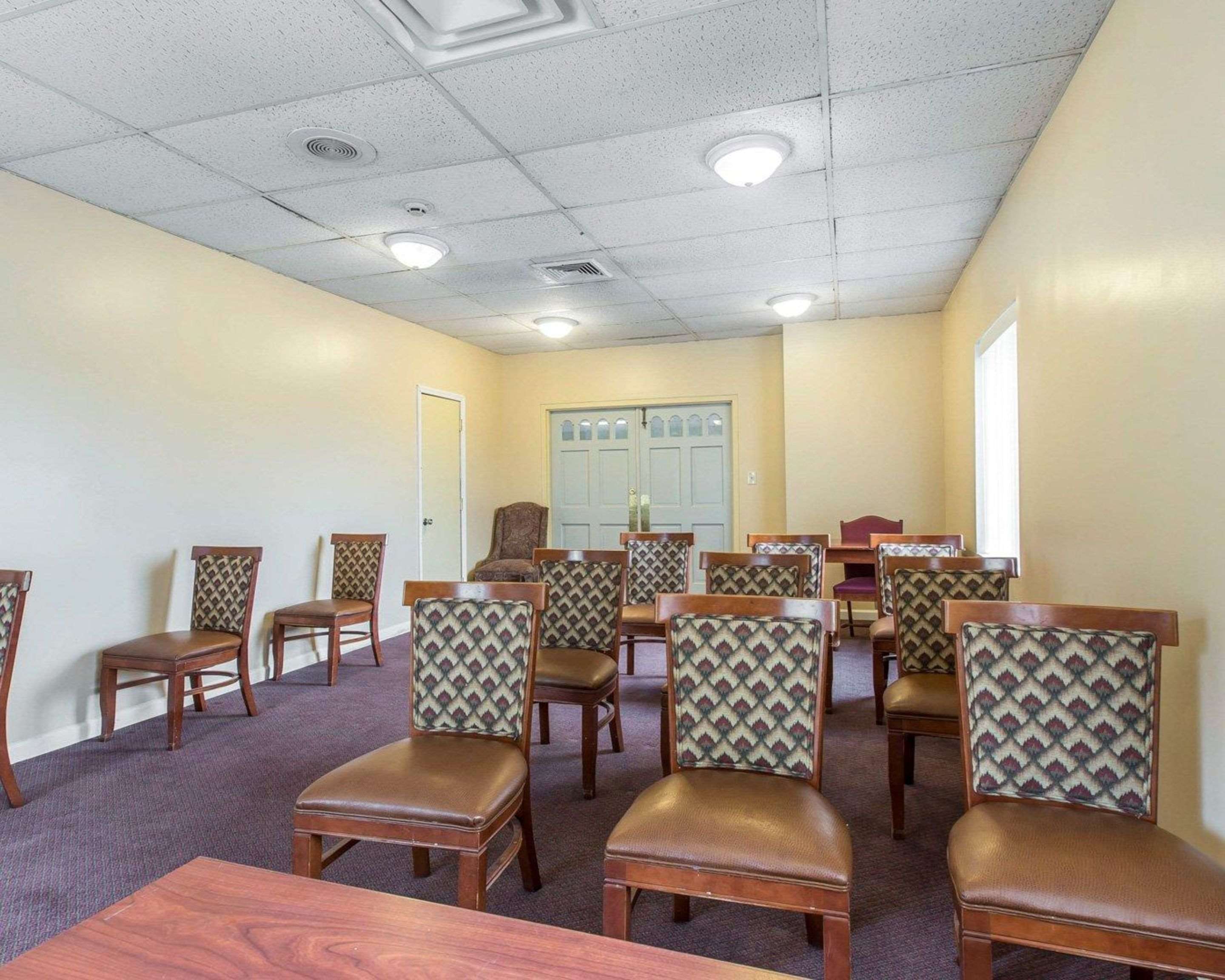 Meeting room with theater-style setup | Econo Lodge
