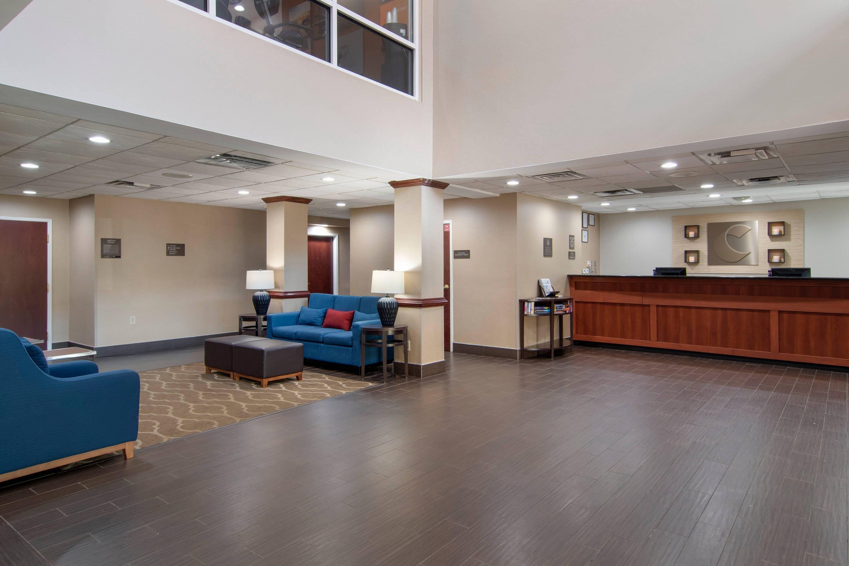 Spacious lobby with sitting area | Comfort Suites