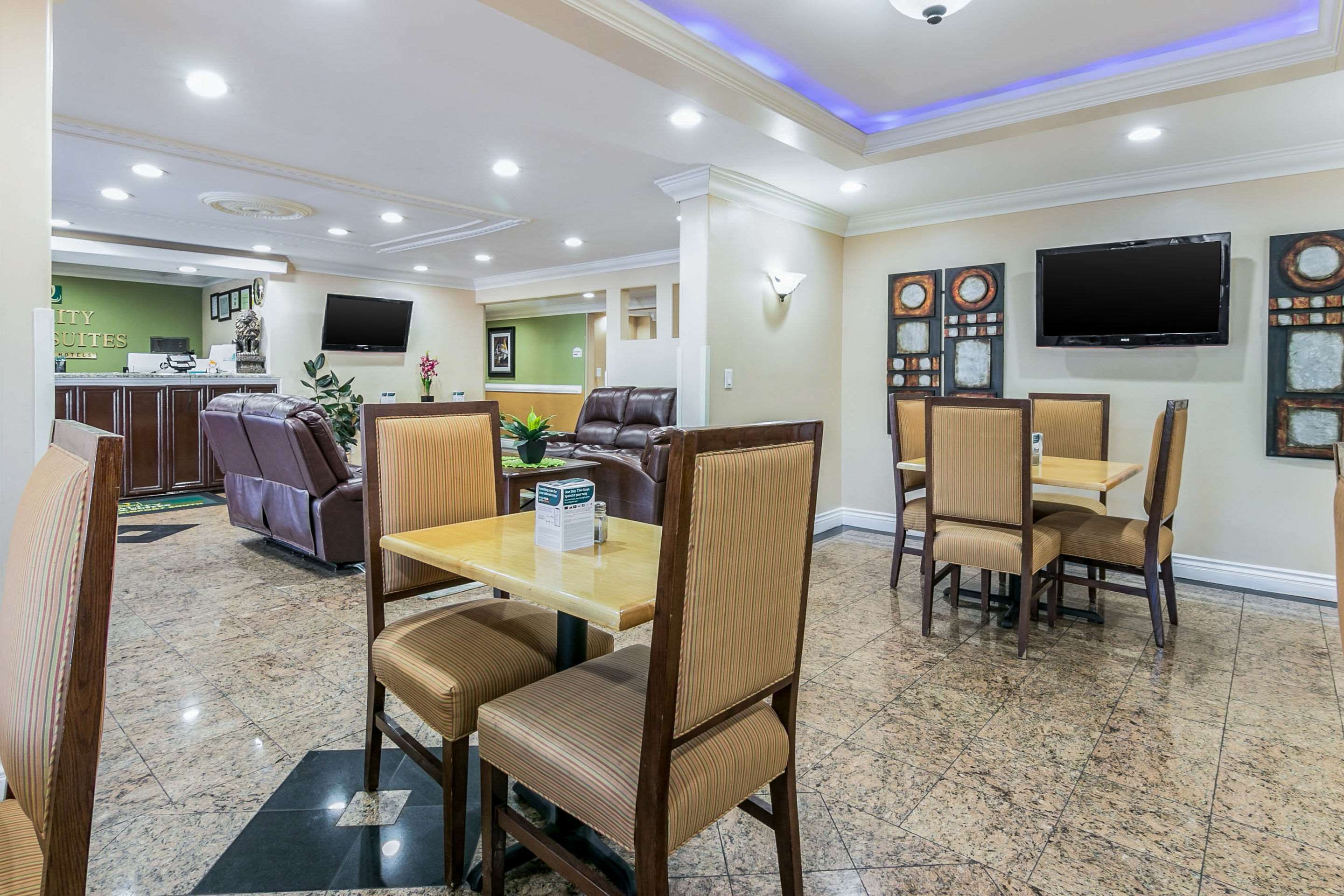 Spacious lobby with sitting area | Quality Inn & Suites Atlanta Airport South