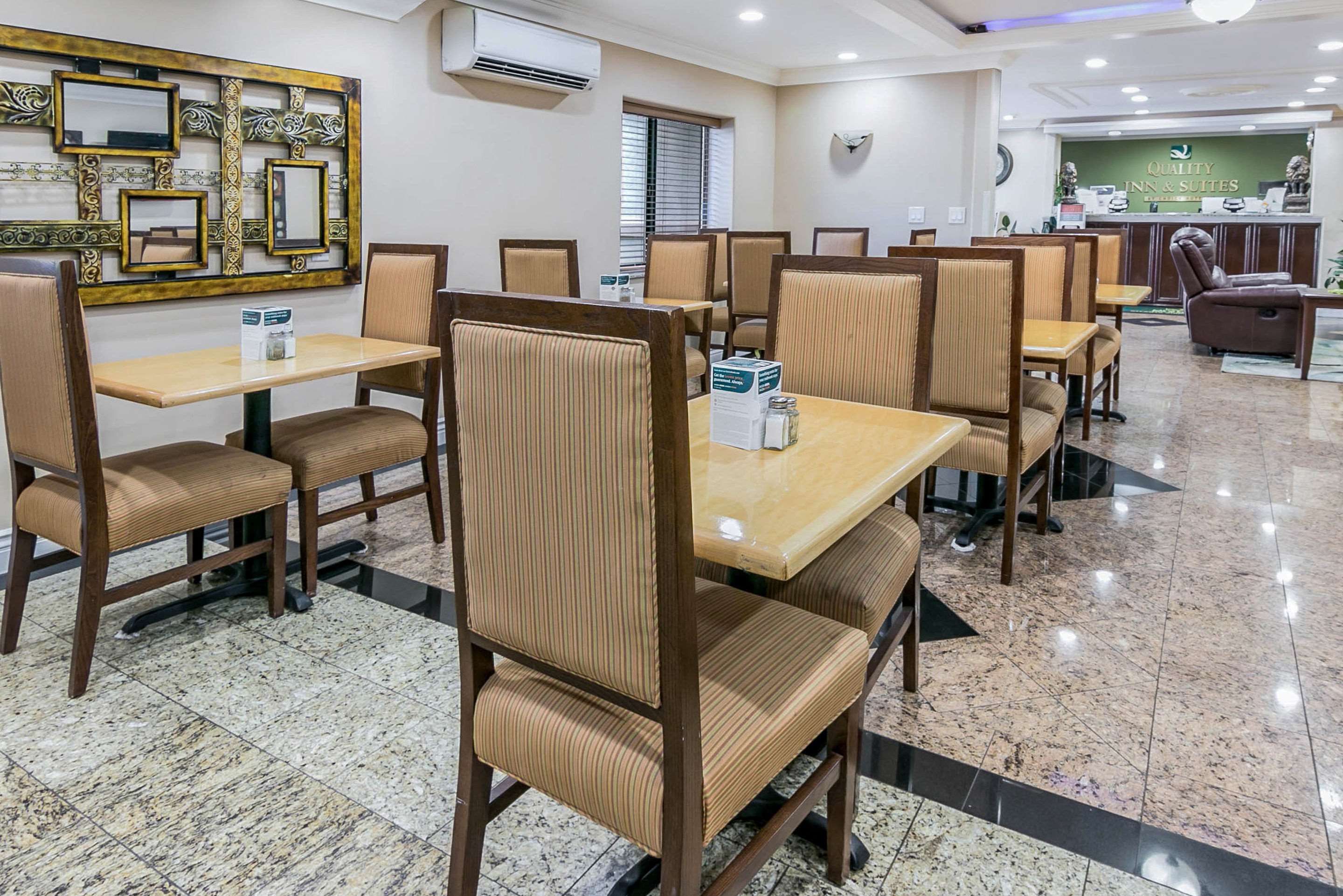 Enjoy breakfast in this seating area | Quality Inn & Suites Atlanta Airport South