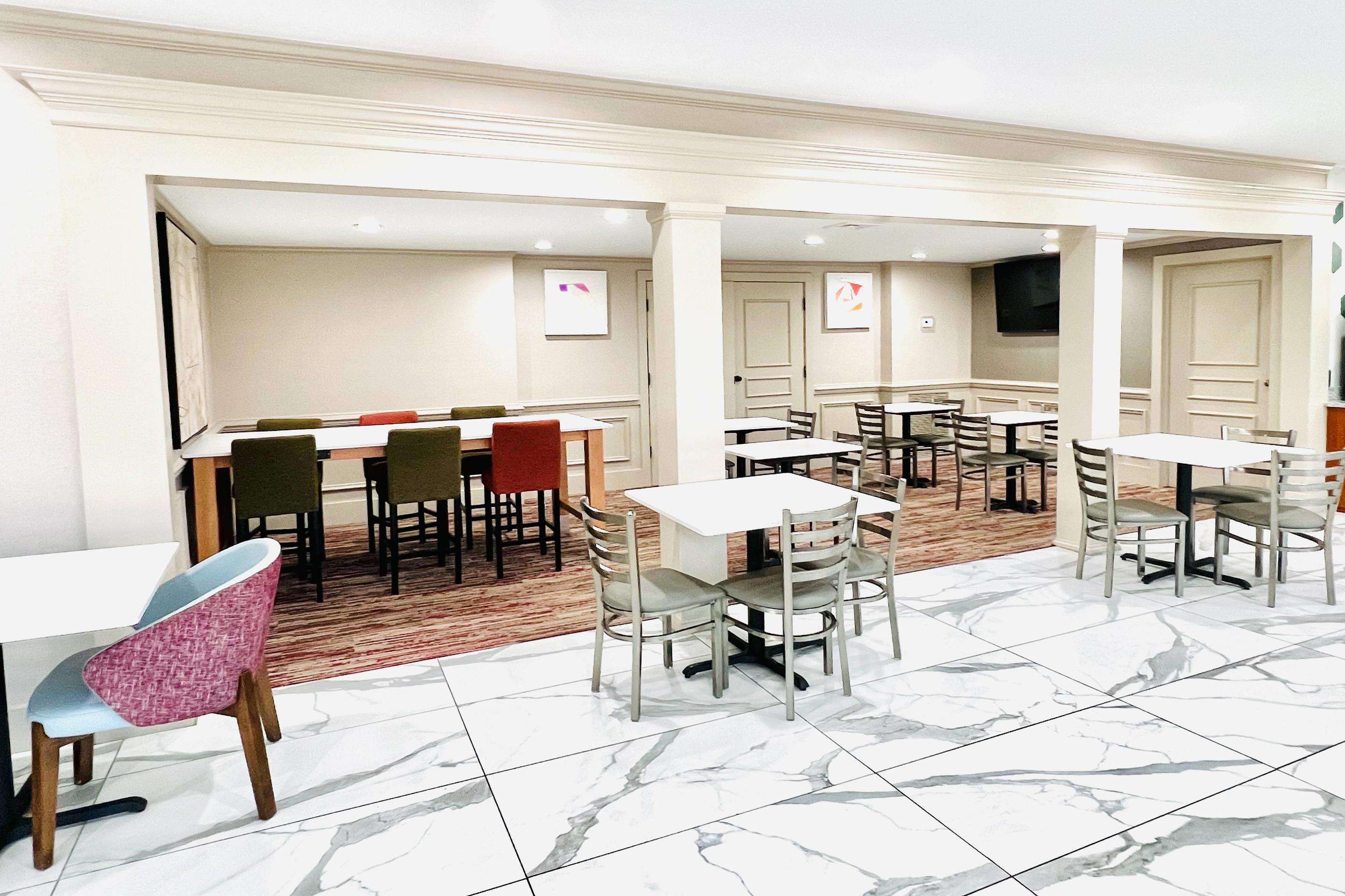 Enjoy breakfast in this seating area | Quality Inn & Suites McDonough South I-75