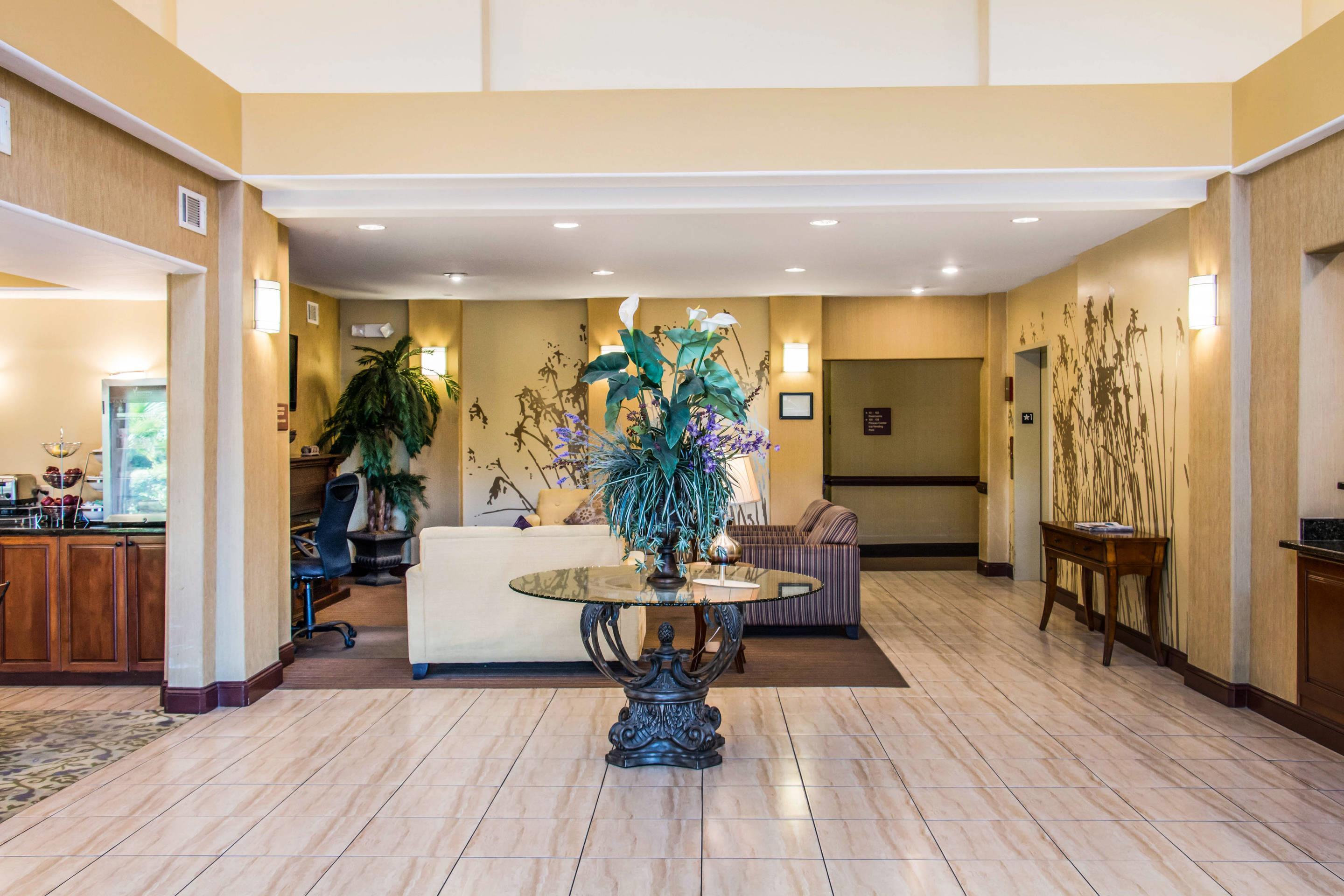 Spacious lobby with sitting area | Sleep Inn & Suites Pooler