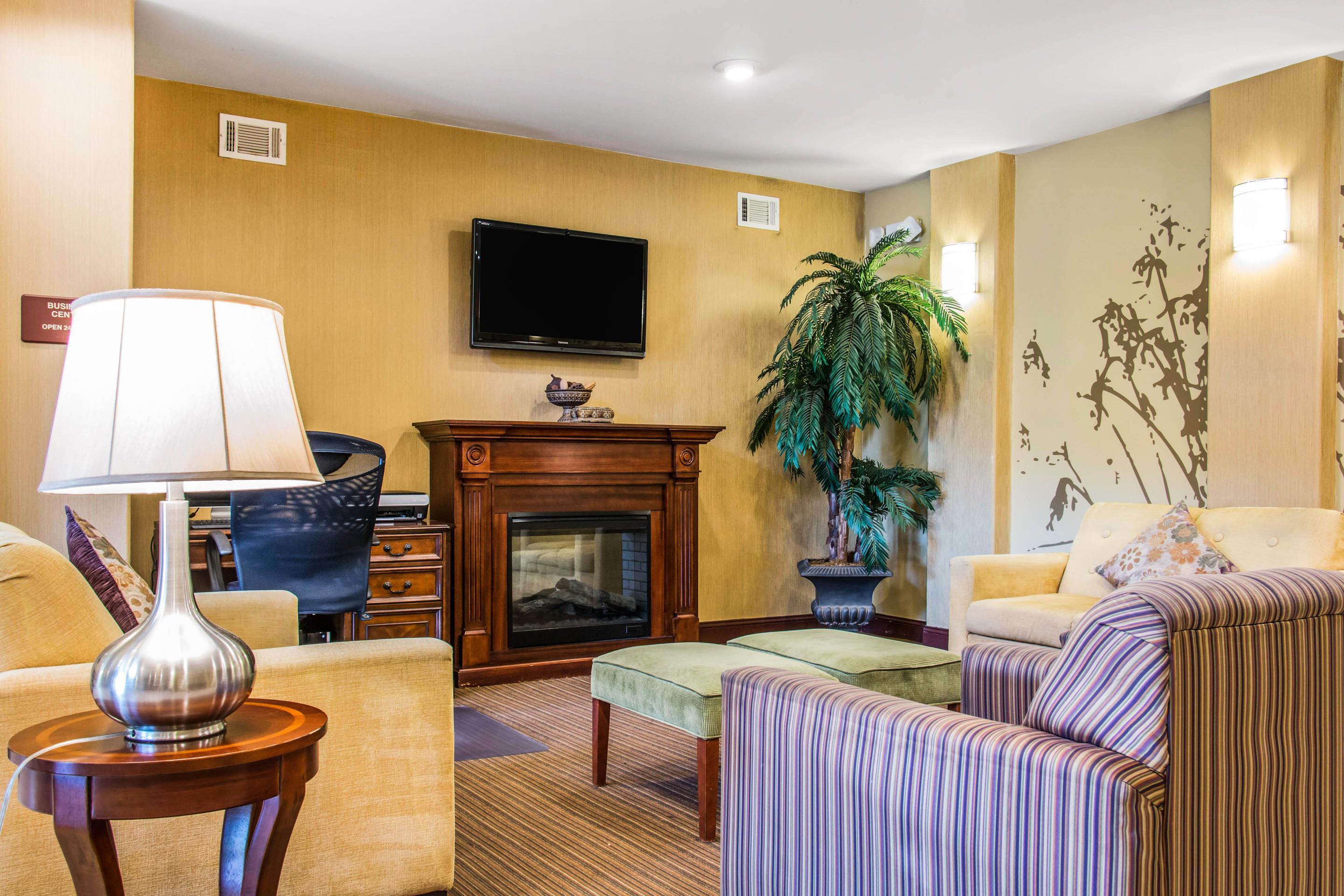 Spacious lobby with sitting area | Sleep Inn & Suites Pooler