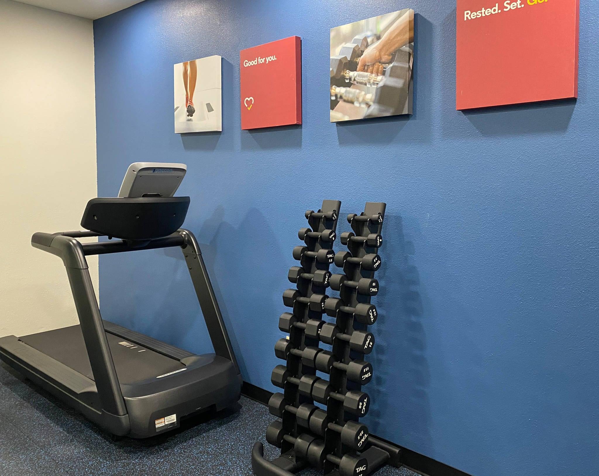 Exercise room with cardio equipment and weights | Comfort Suites Kings Bay Naval Base Area