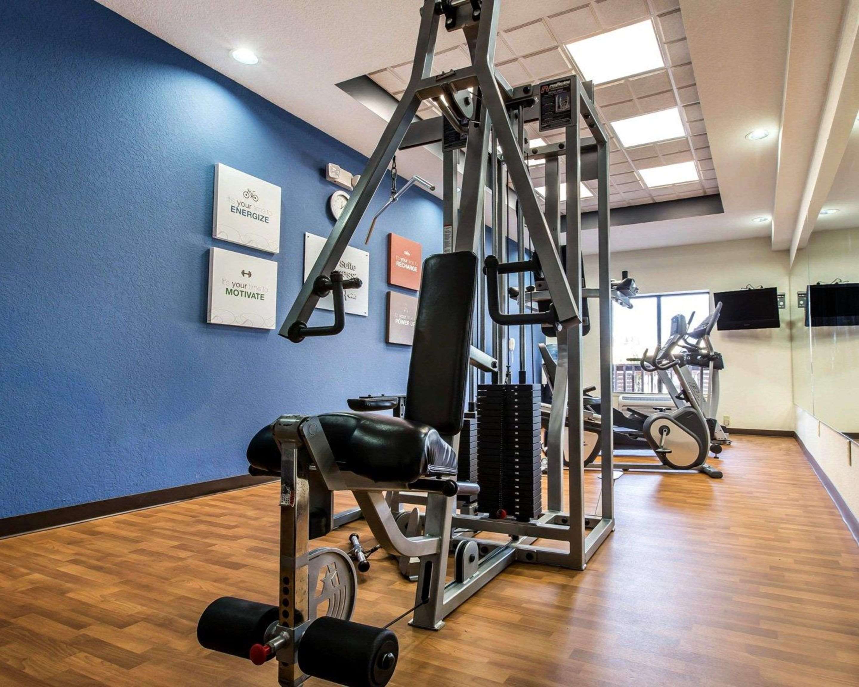 Fitness center with cardio equipment and weights | Comfort Suites Waycross
