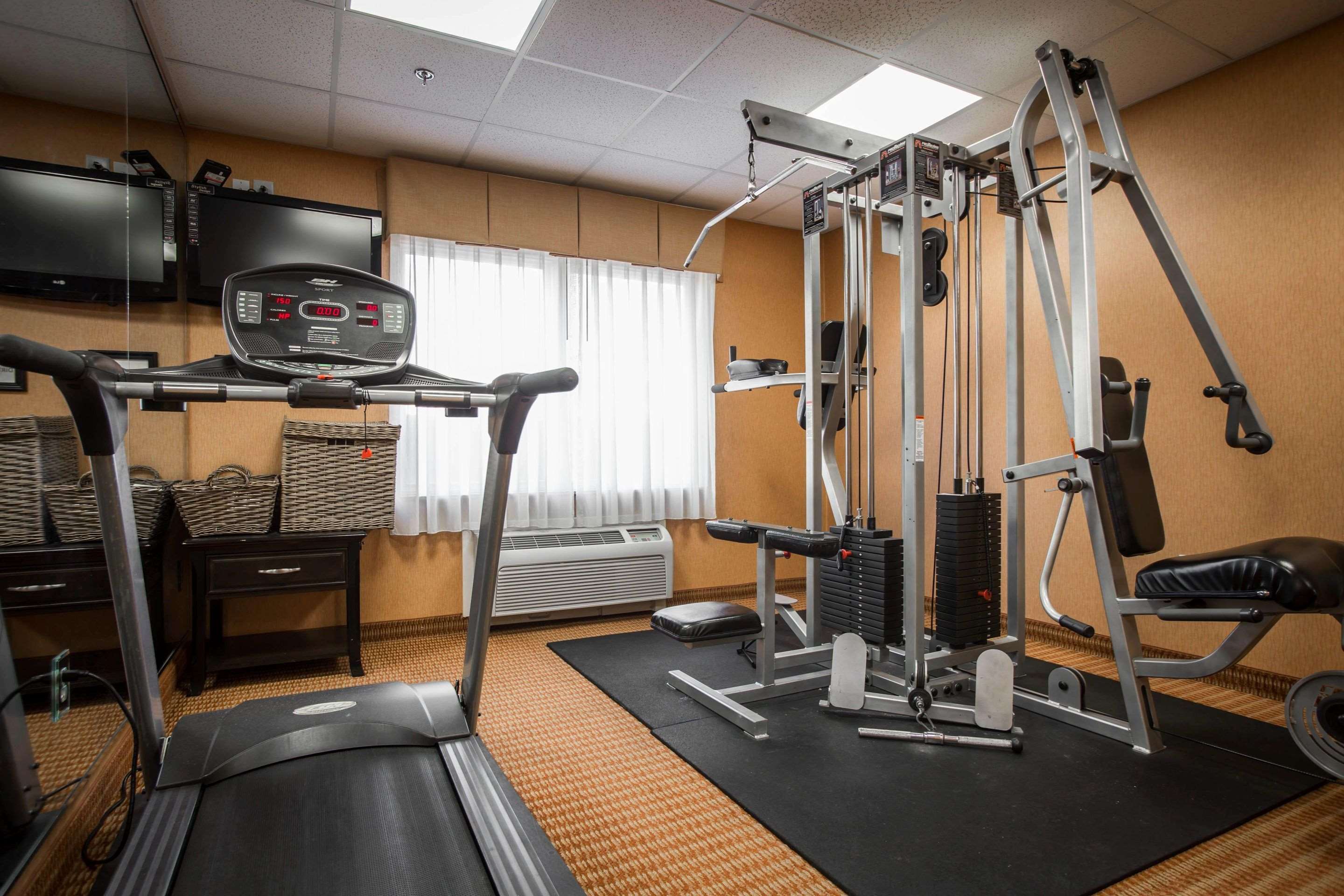 Fitness center with cardio equipment and weights