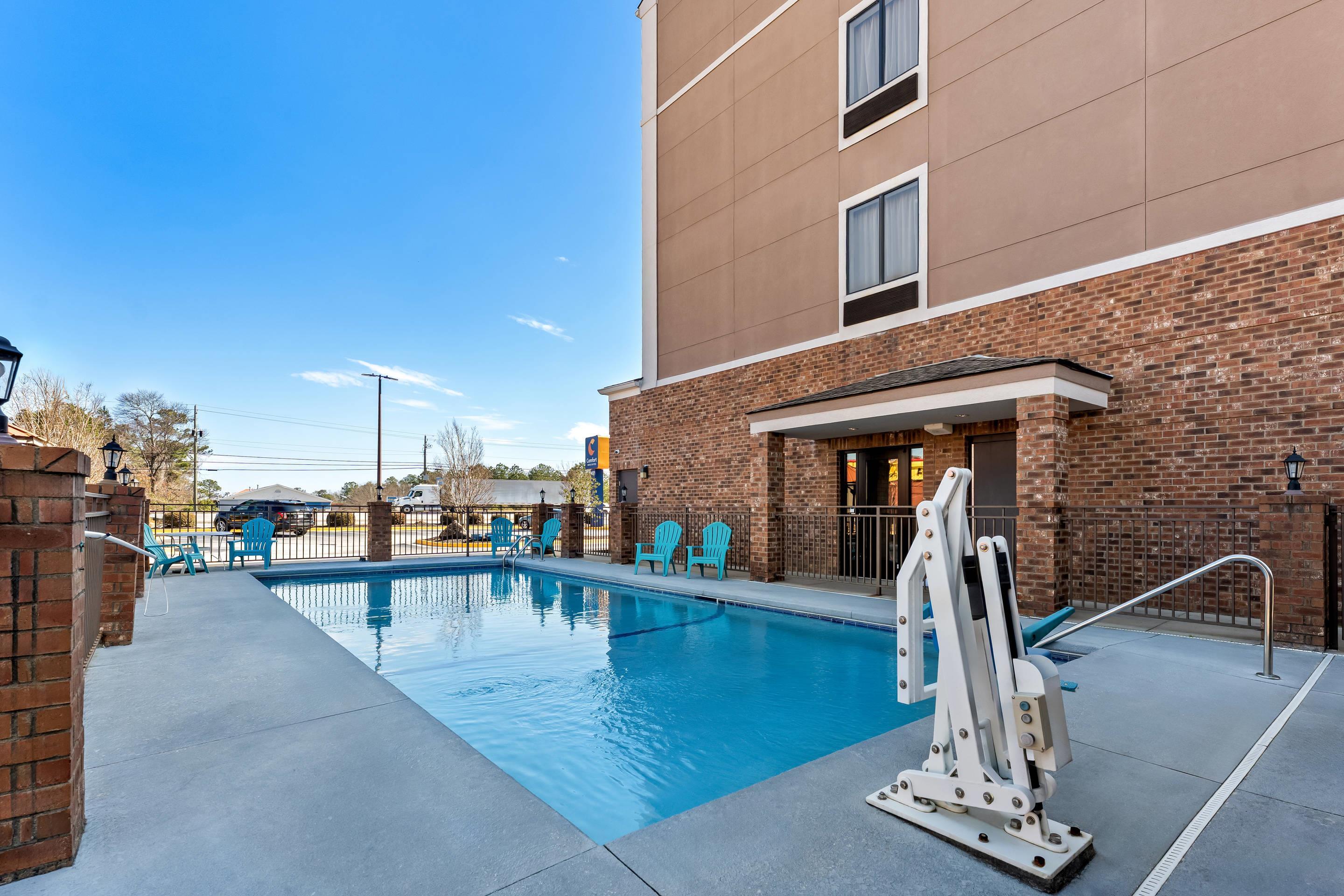 Outdoor pool | Comfort Inn & Suites Augusta West Near Fort Eisenhower