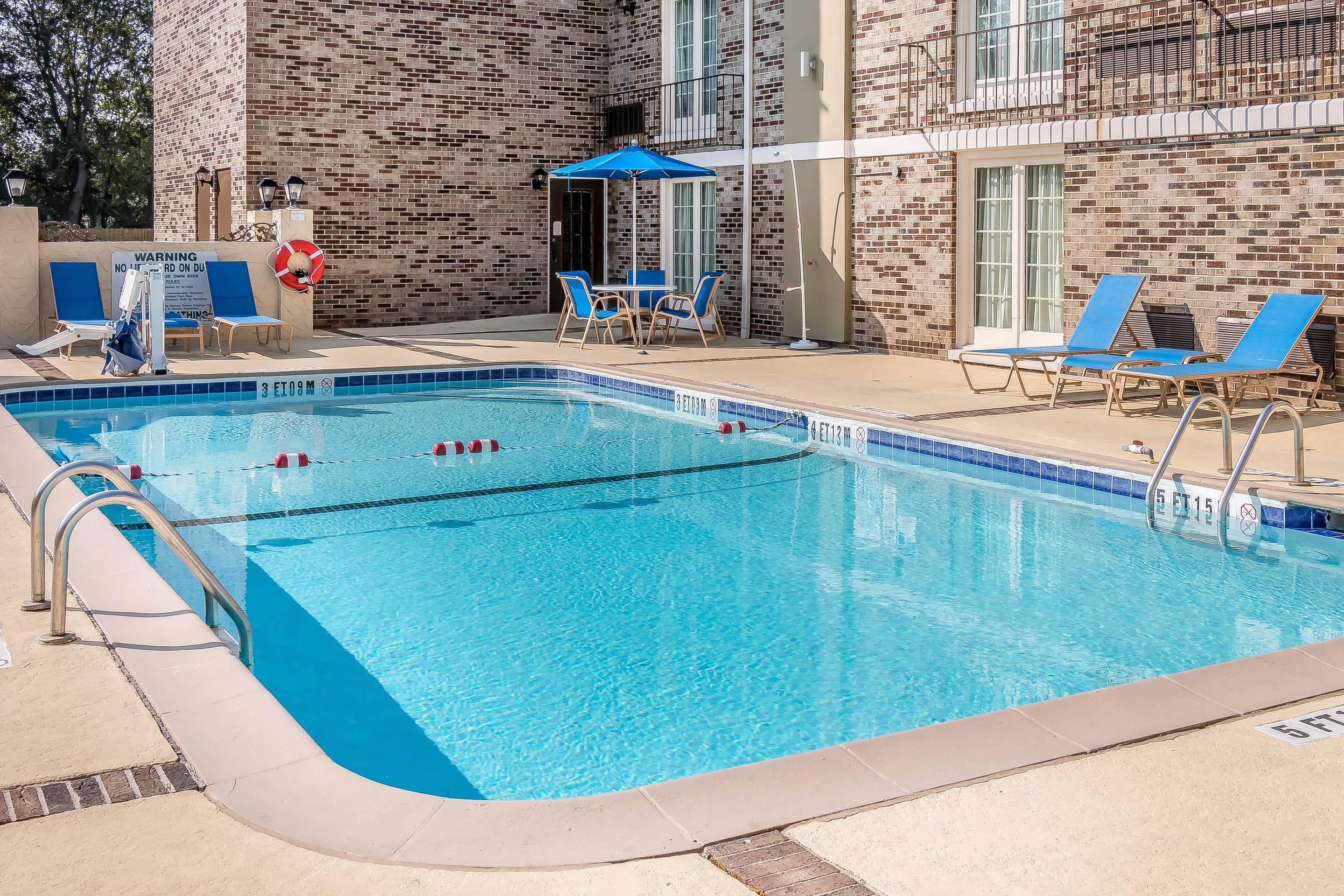 Relax by the pool | Comfort Inn