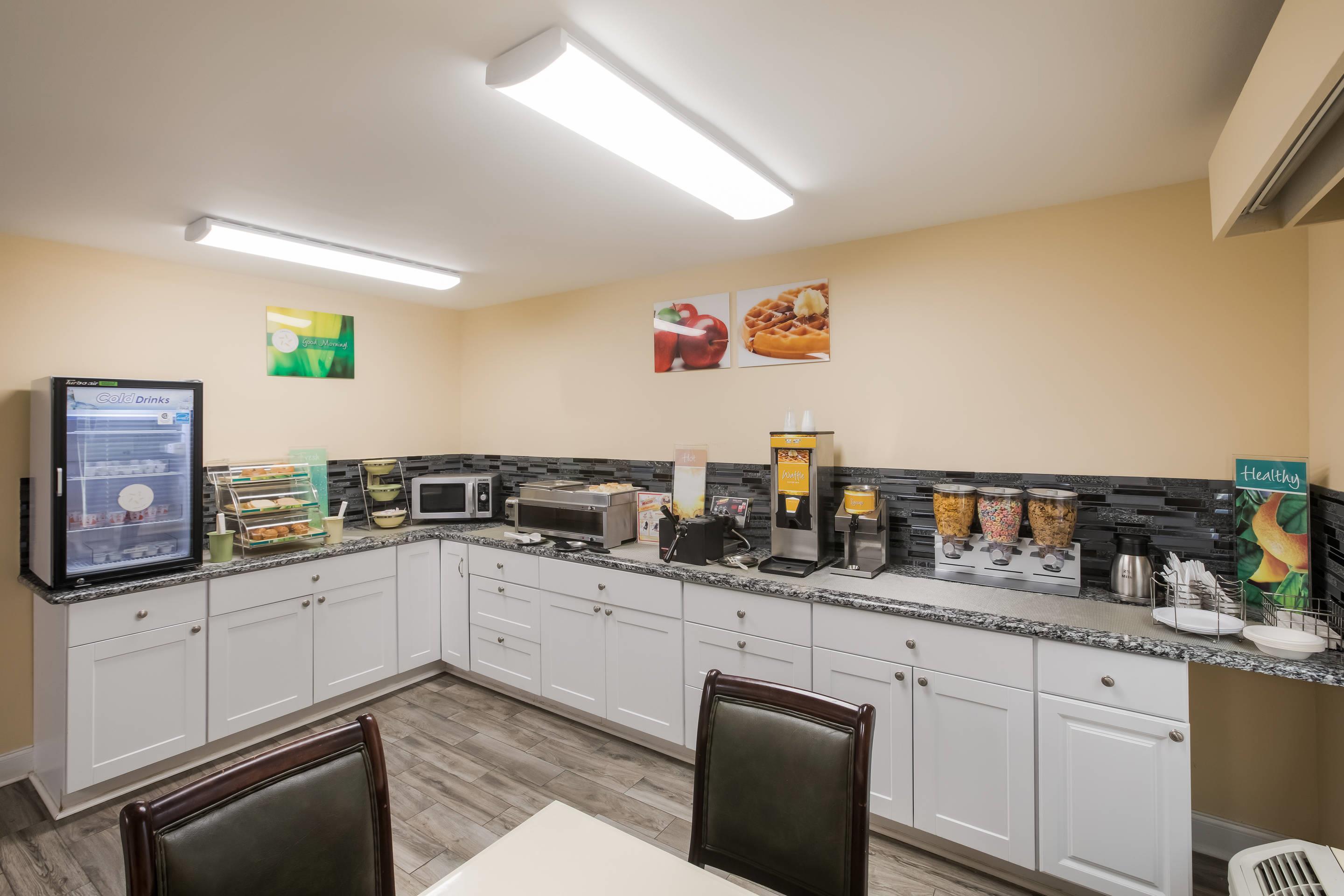 Breakfast counter | Quality Inn & Suites near Lake Oconee