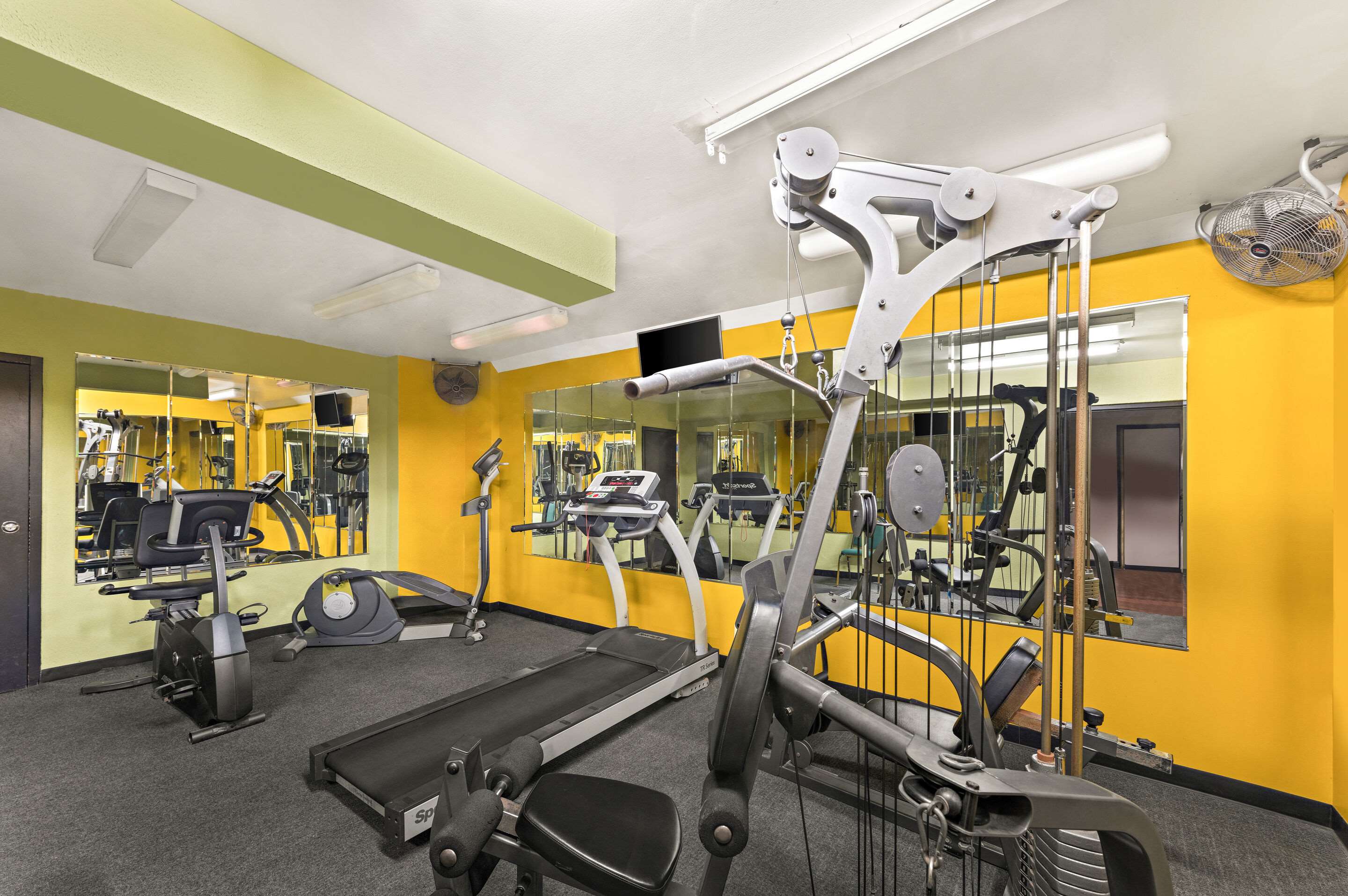 Exercise room with cardio equipment | Quality Inn & Suites Council Bluffs - Omaha East