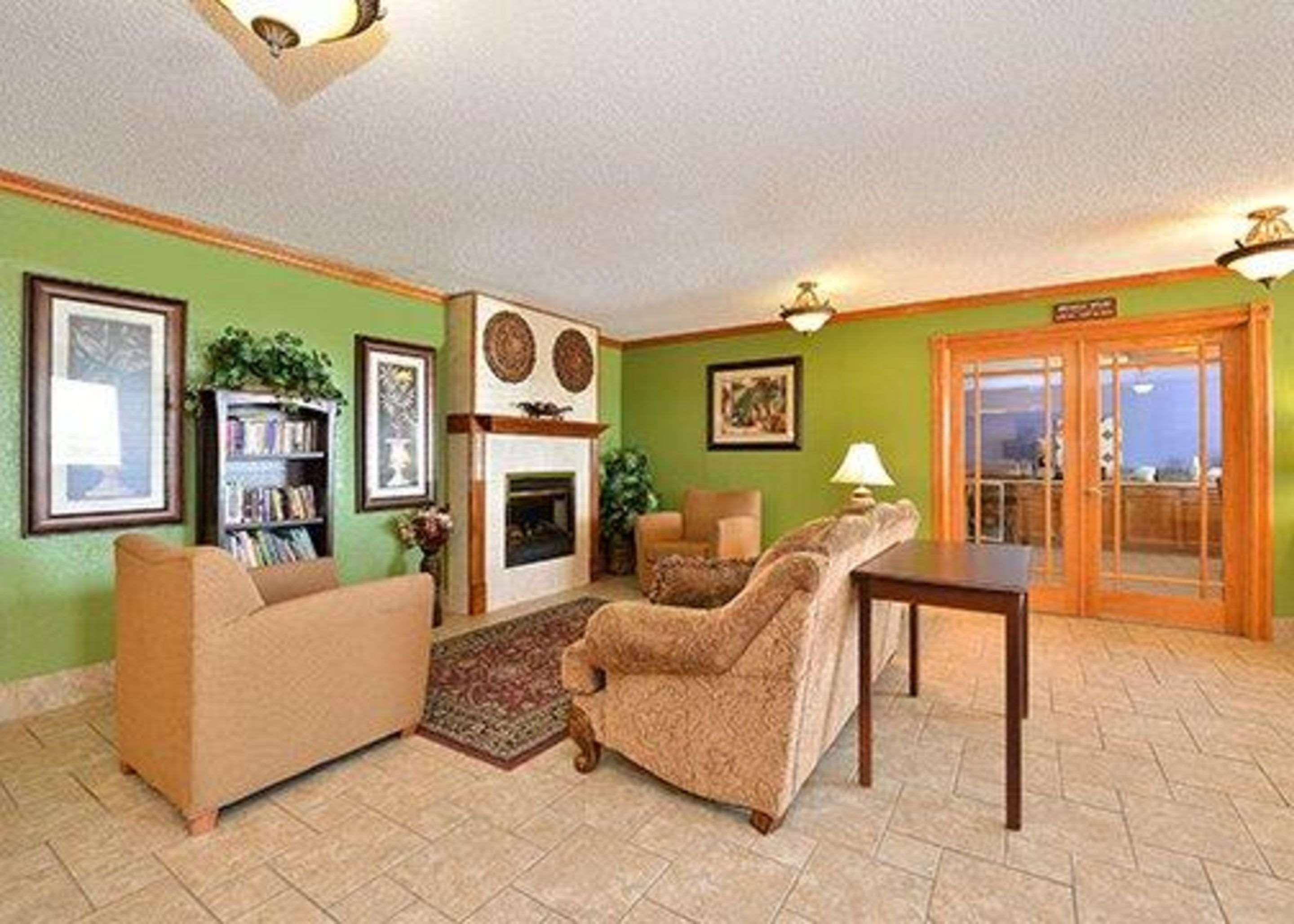 Spacious lobby with sitting area | Quality Inn & Suites Grinnell near University