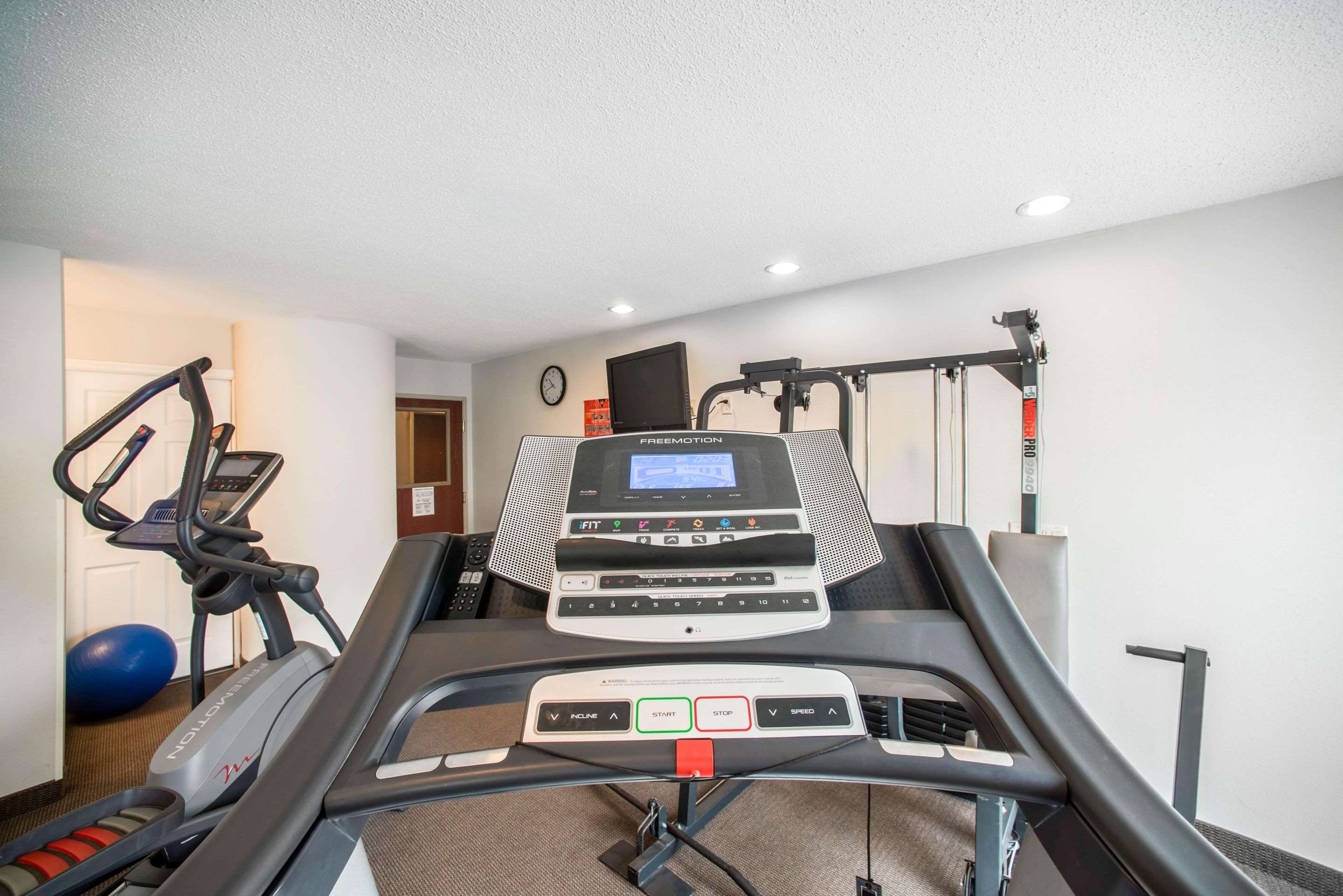 Fitness center with cardio equipment and weights