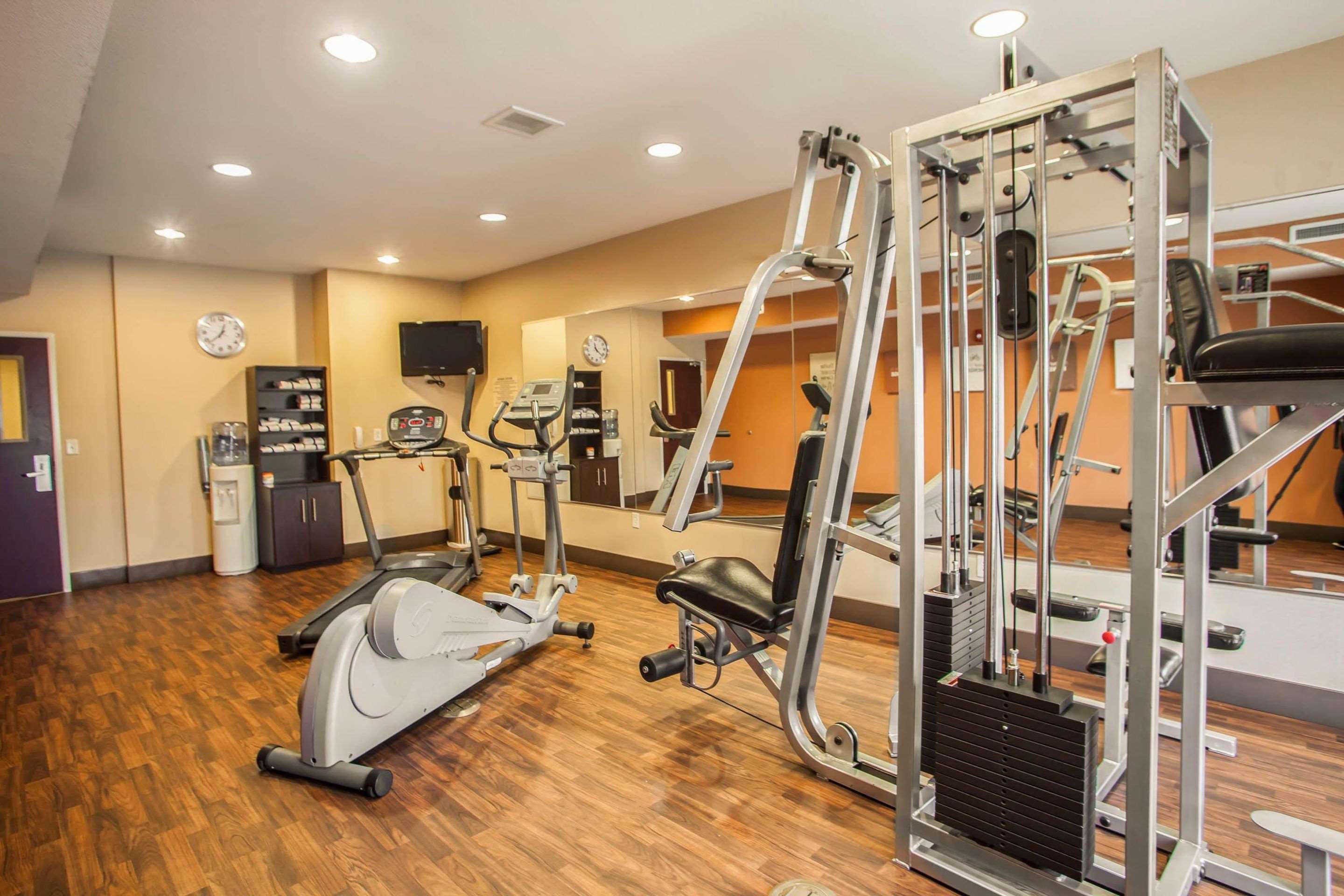 Fitness center with cardio equipment and weights