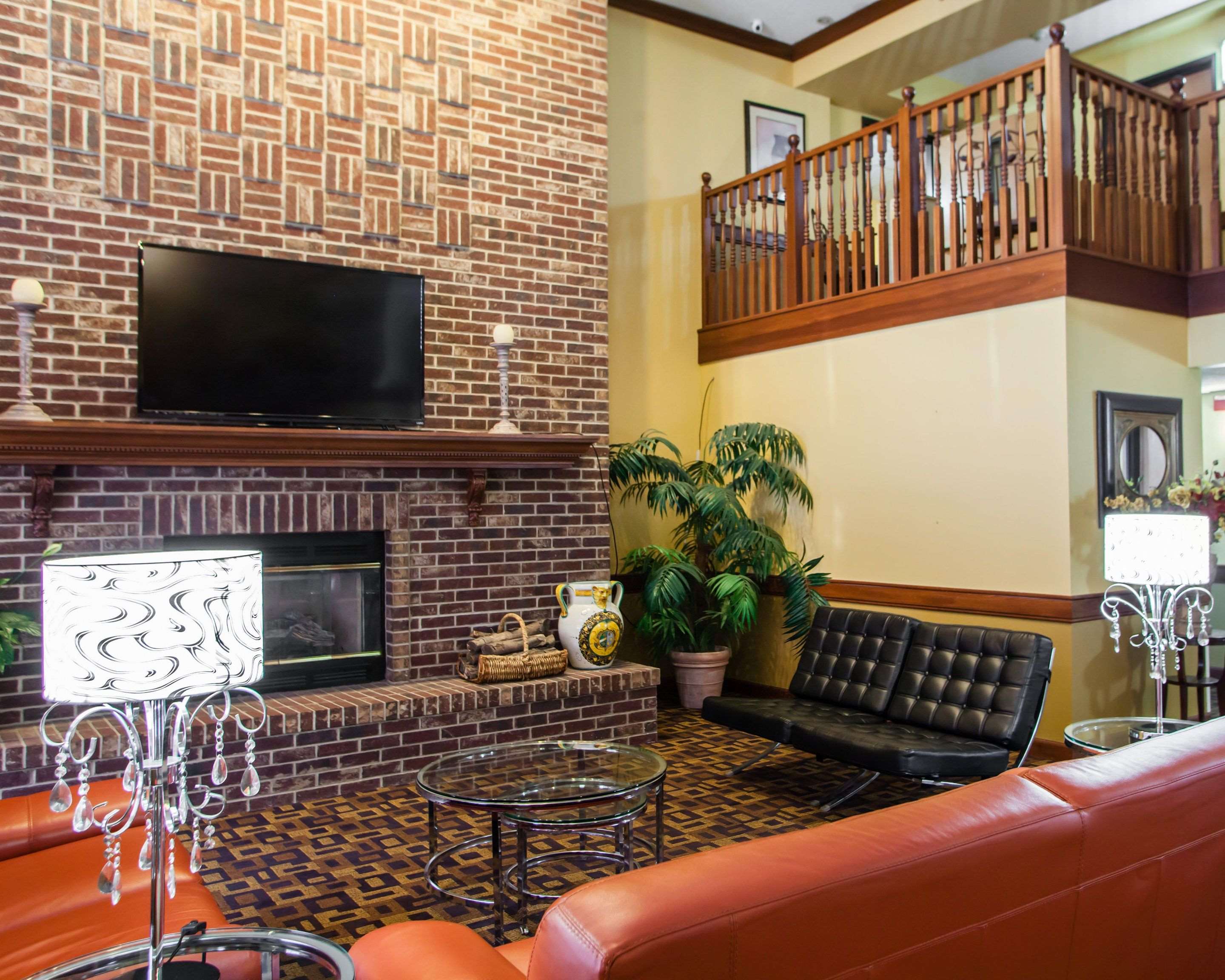 Relax by the fireplace in the lobby | Quality Inn Bolingbrook I-55