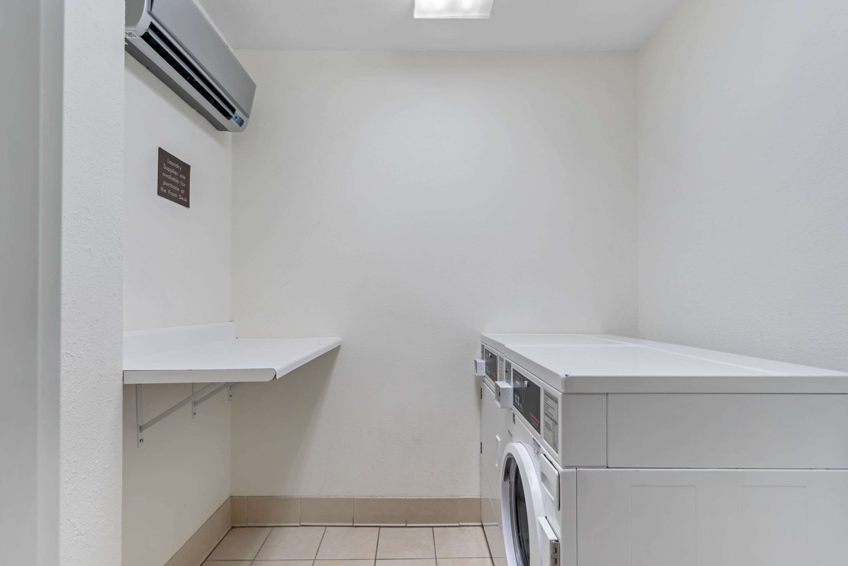 Guest laundry facilities | Comfort Suites Normal University area