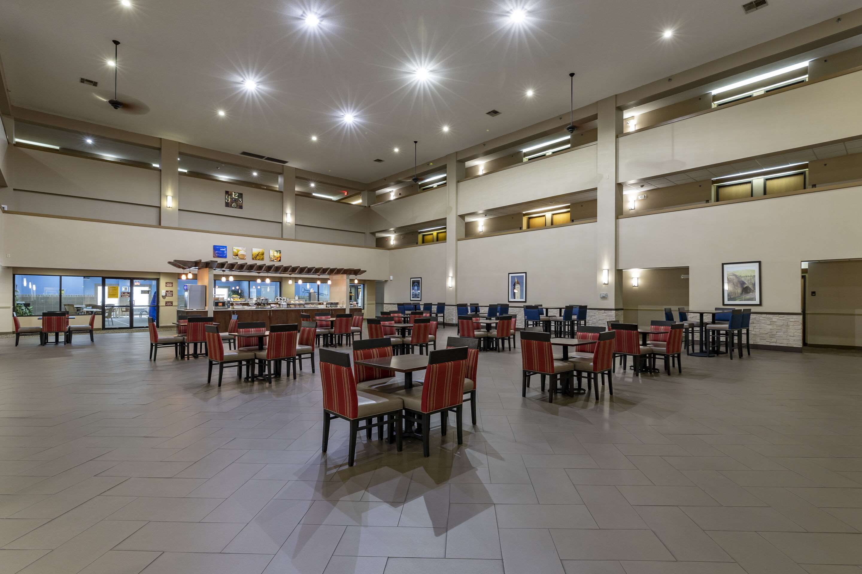 Enjoy breakfast in this seating area | Comfort Inn Collinsville