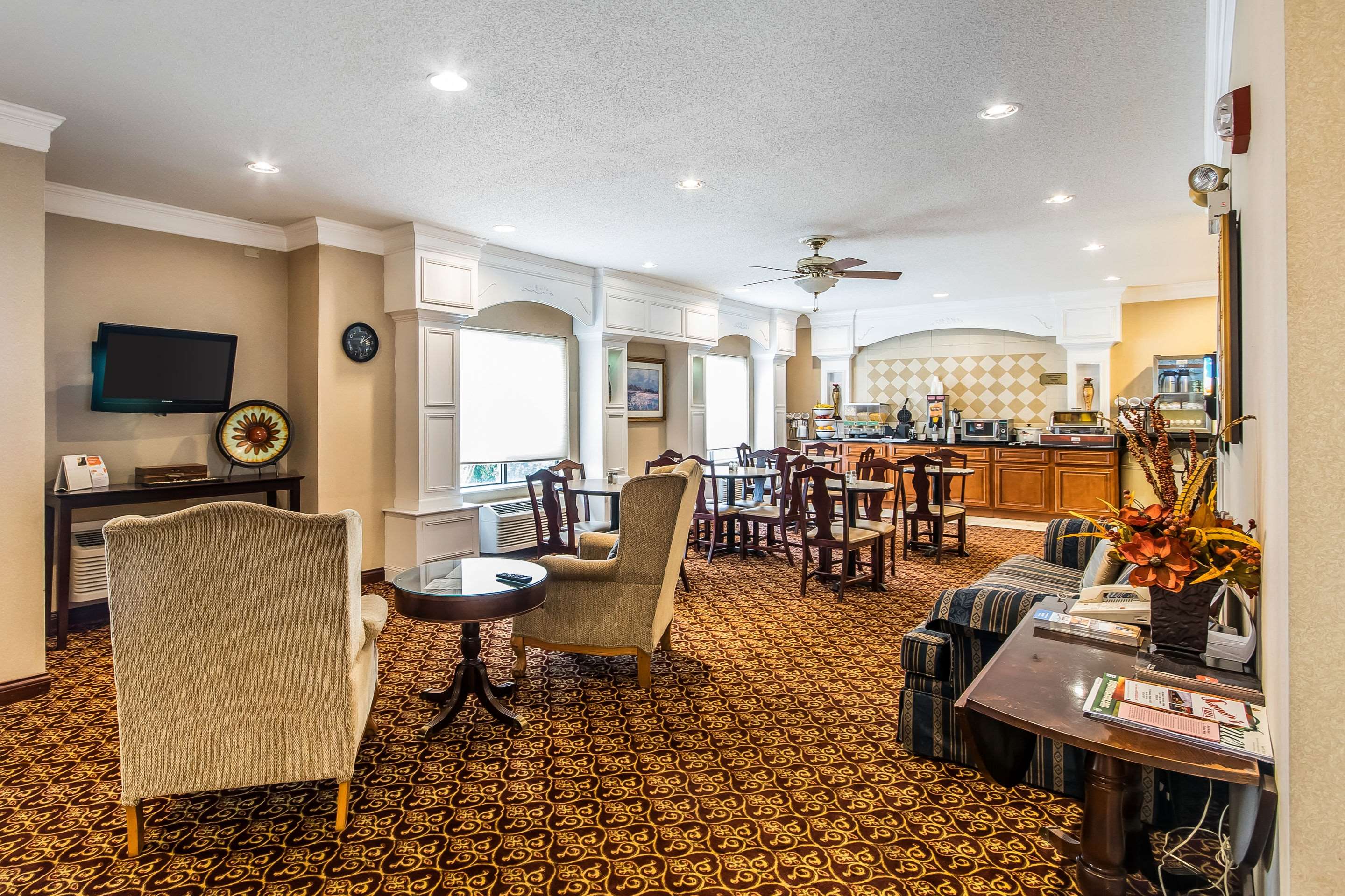 Spacious lobby with sitting area | Quality Inn & Suites