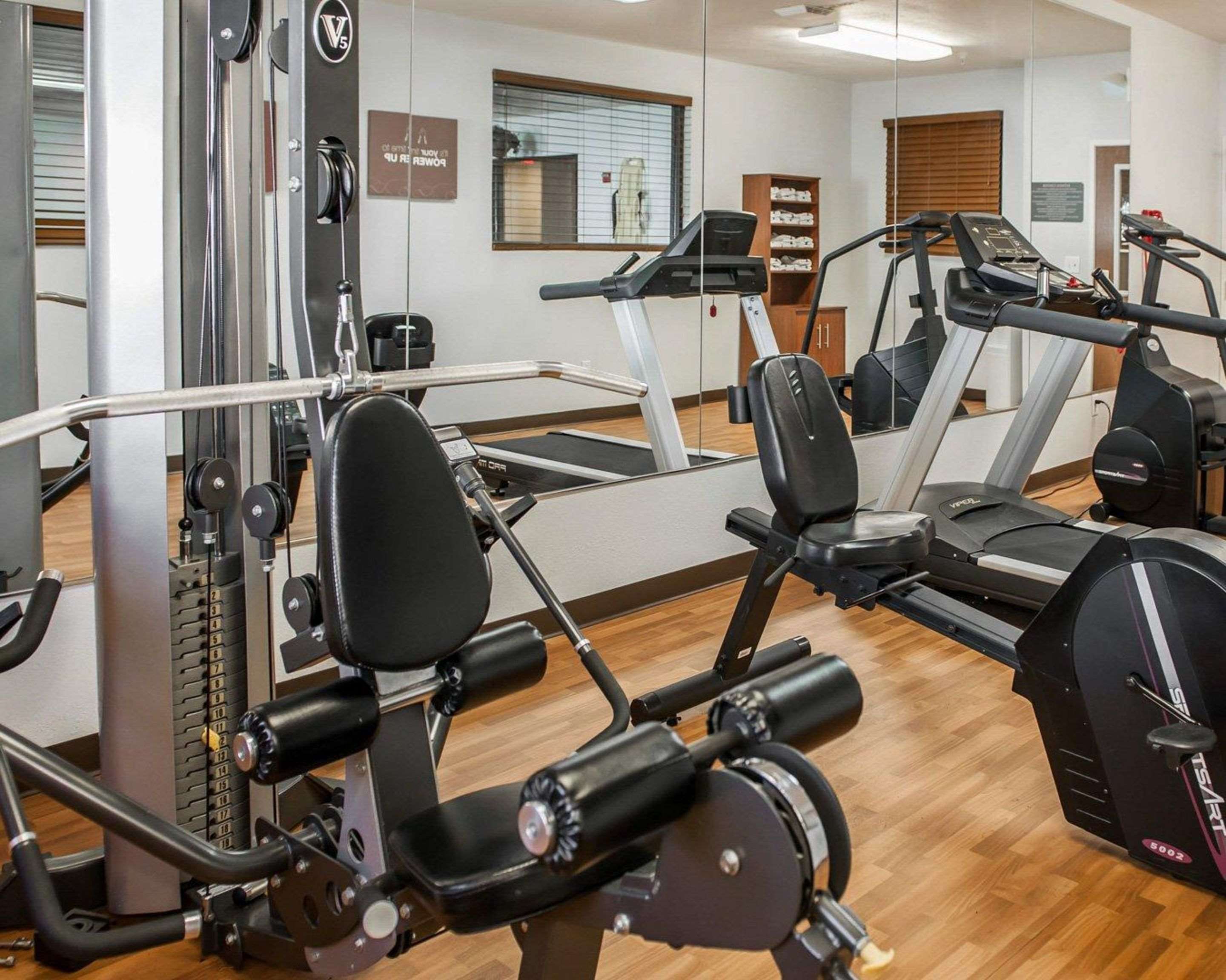 Fitness center with cardio equipment and weights | Quality Suites NE Indianapolis Fishers