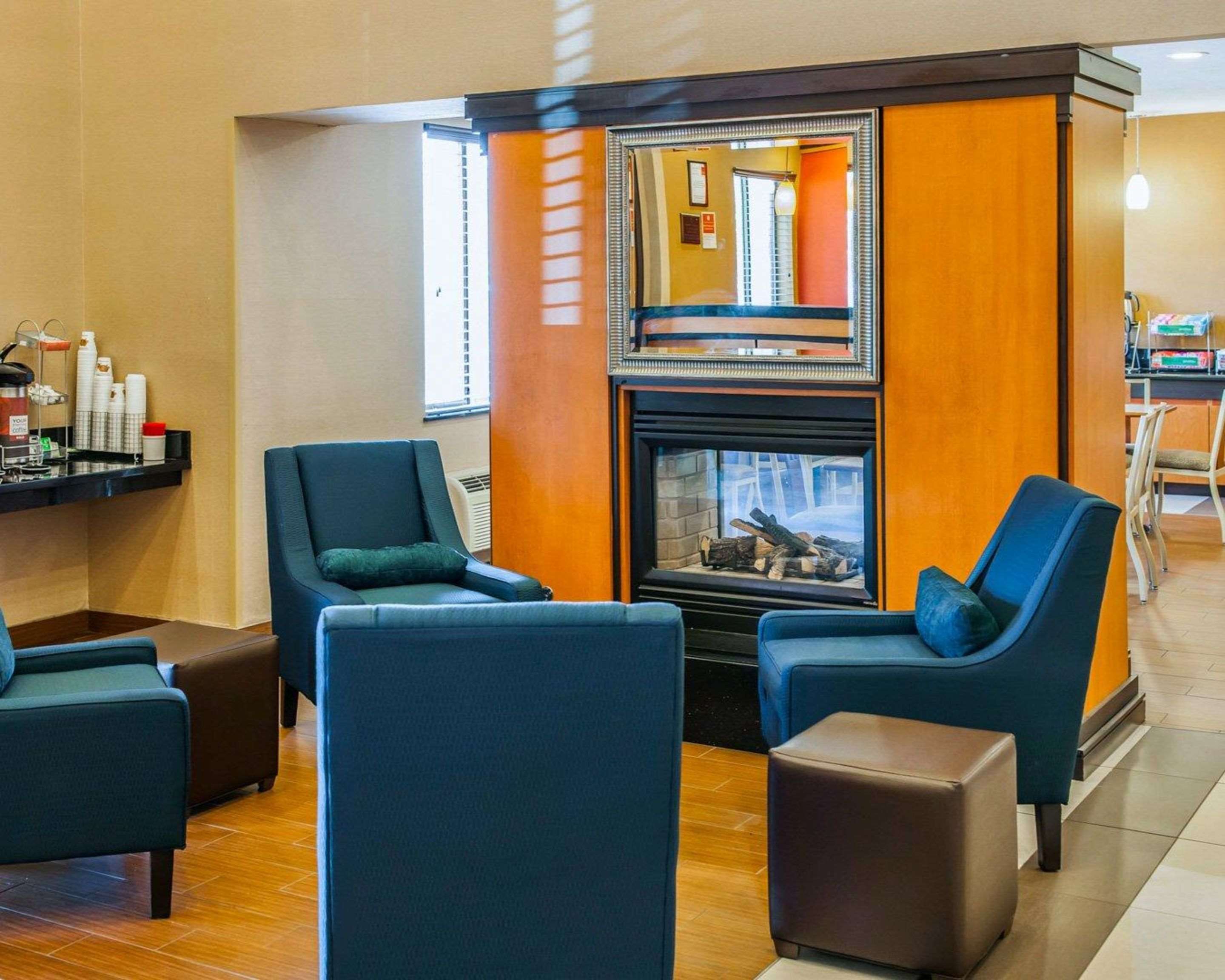 Lobby with fireplace | Quality Suites NE Indianapolis Fishers