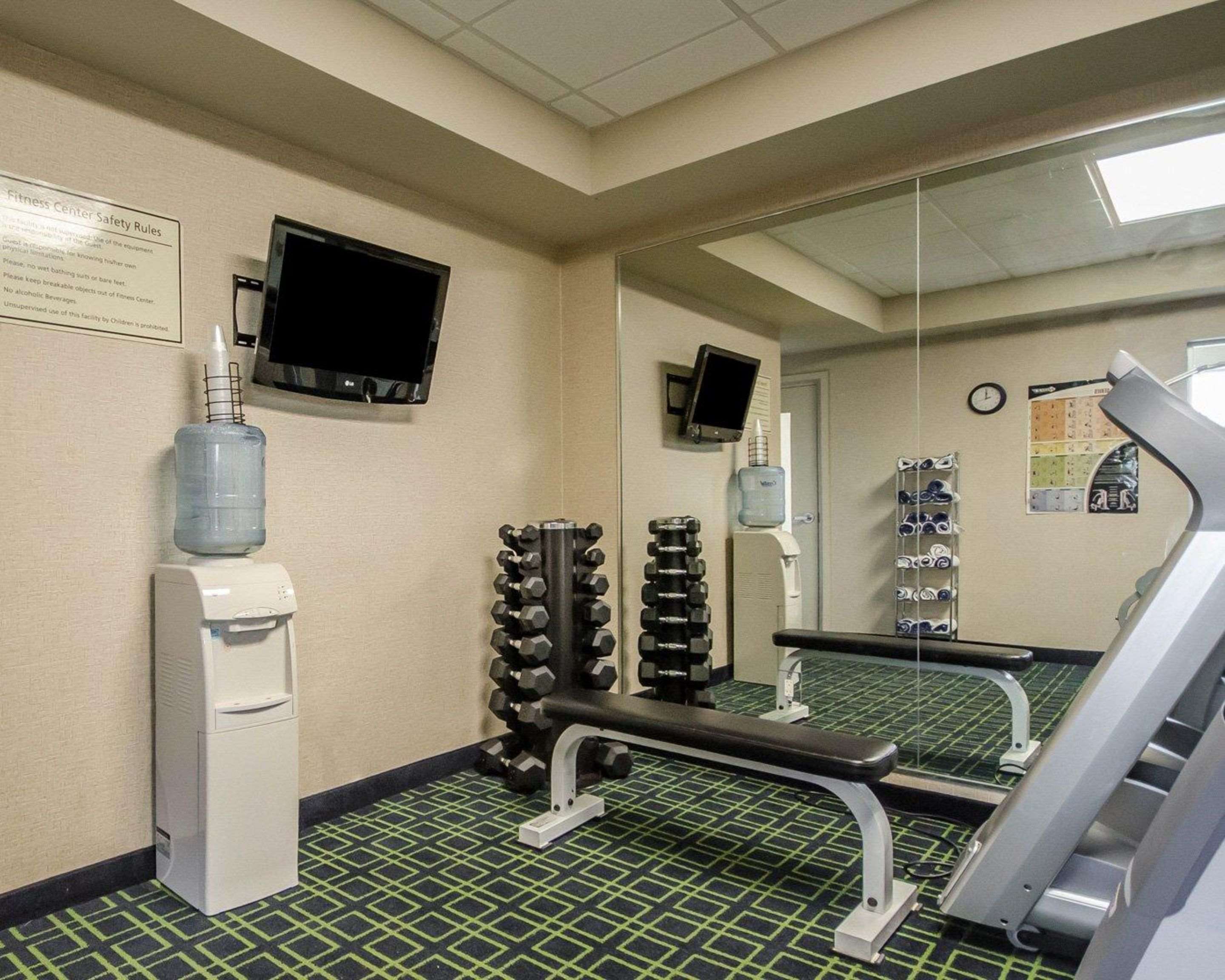 Exercise room with television | Clarion Pointe by Choice Hotels Corydon