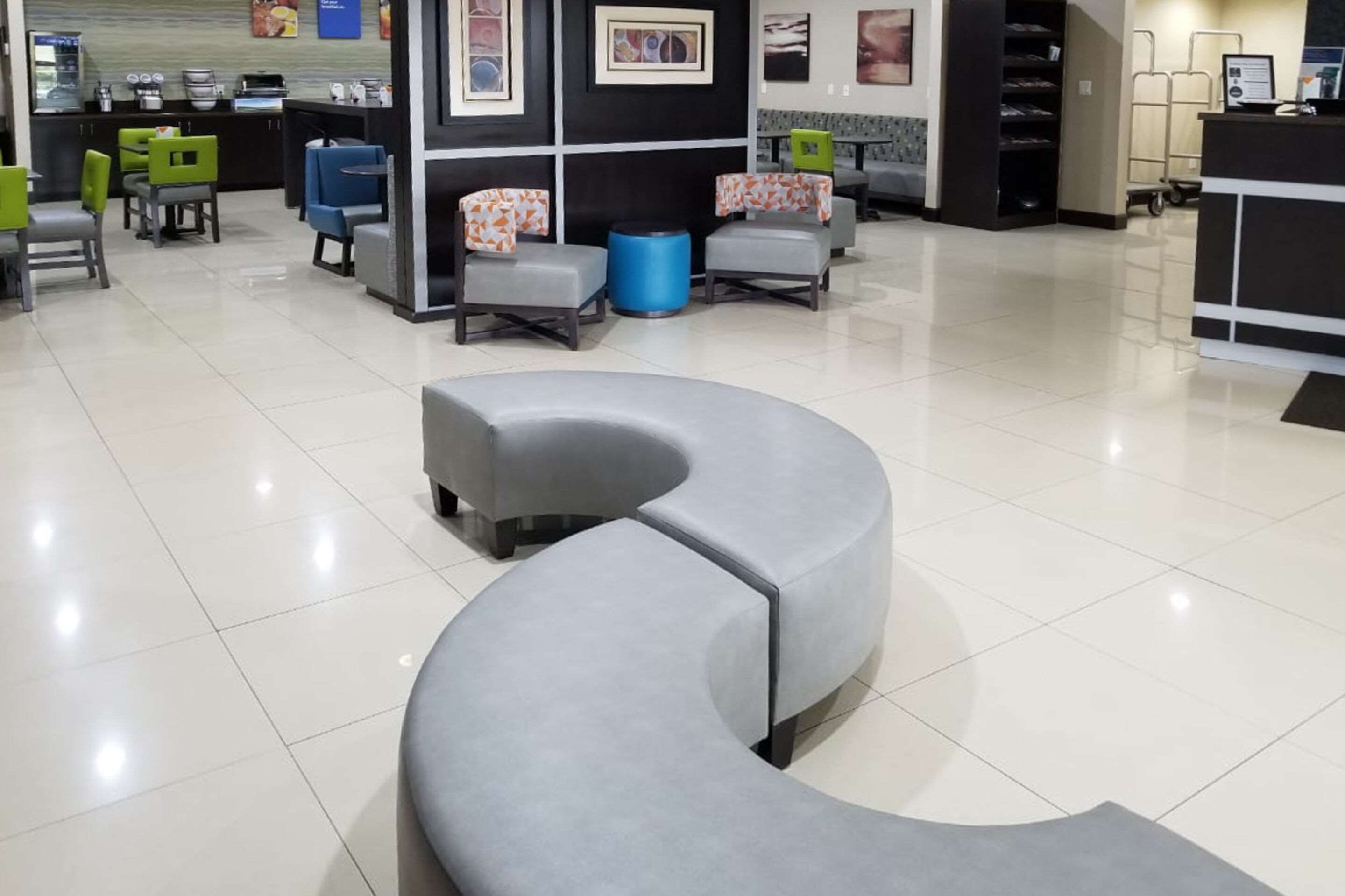 Spacious lobby with sitting area | Clarion Pointe by Choice Hotels Corydon