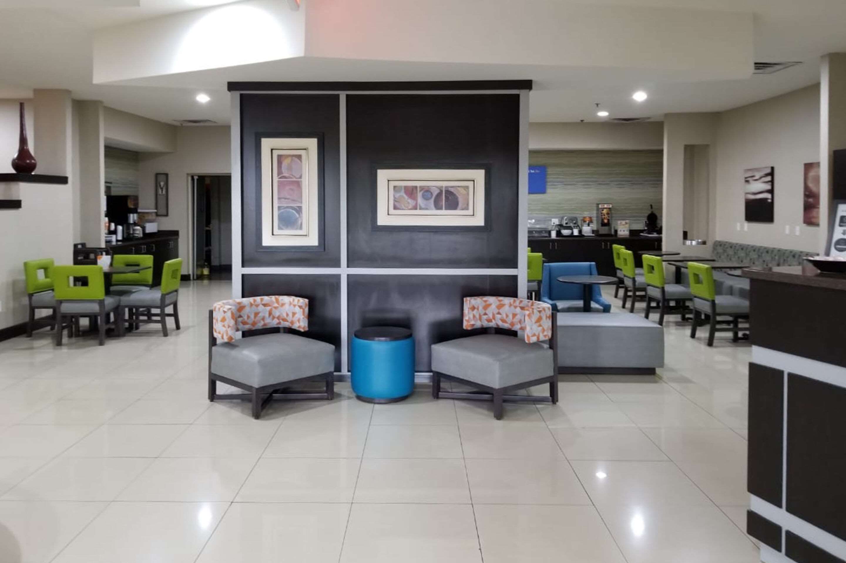 Spacious lobby with sitting area | Clarion Pointe by Choice Hotels Corydon