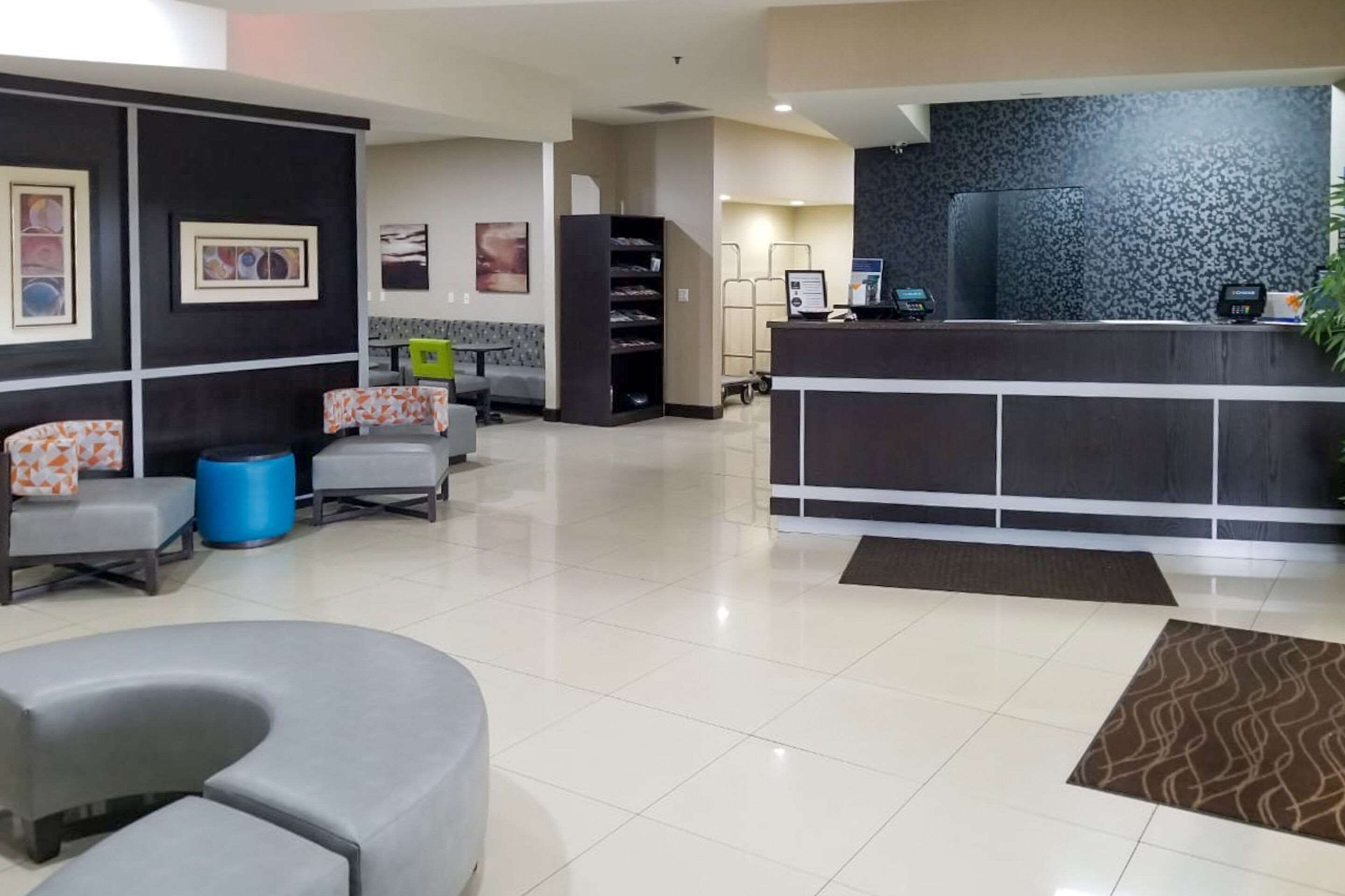 Spacious lobby with sitting area | Clarion Pointe by Choice Hotels Corydon