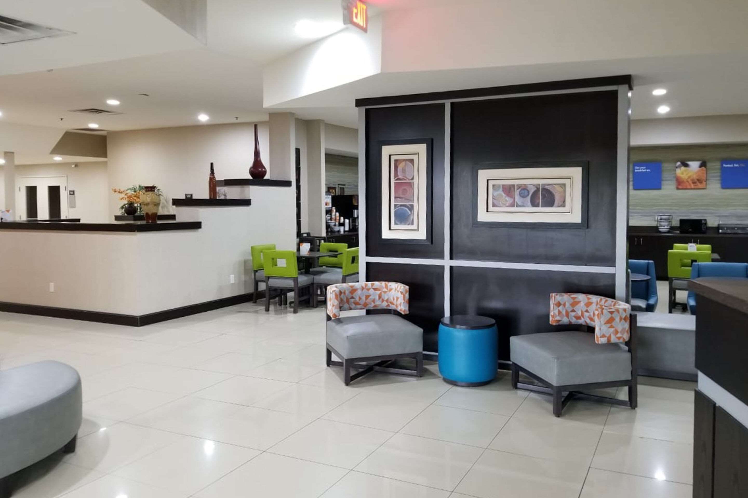 Spacious lobby with sitting area | Clarion Pointe by Choice Hotels Corydon