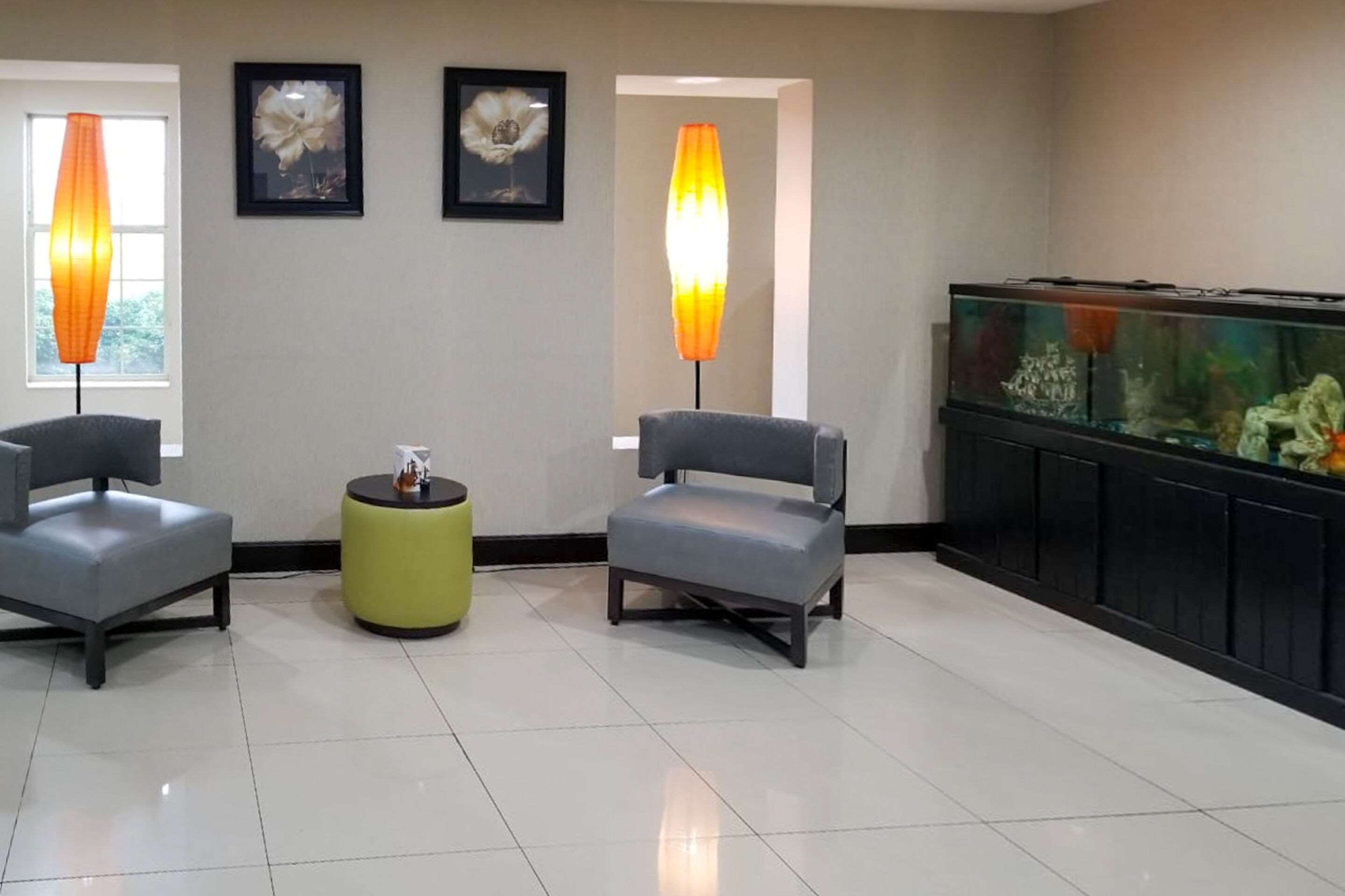 Spacious lobby with sitting area | Clarion Pointe by Choice Hotels Corydon