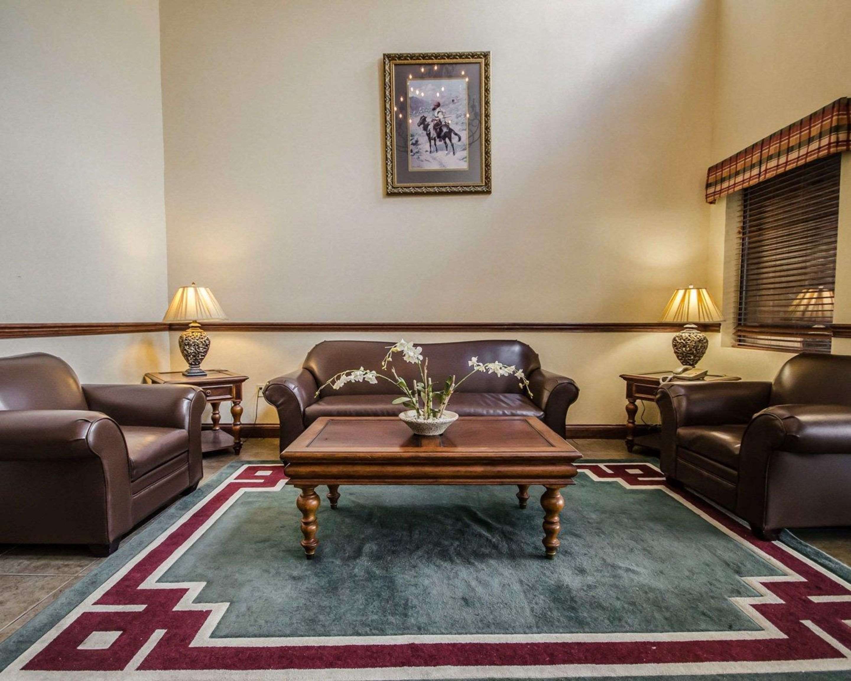 Spacious lobby with sitting area | Quality Suites Jeffersonville - Louisville North