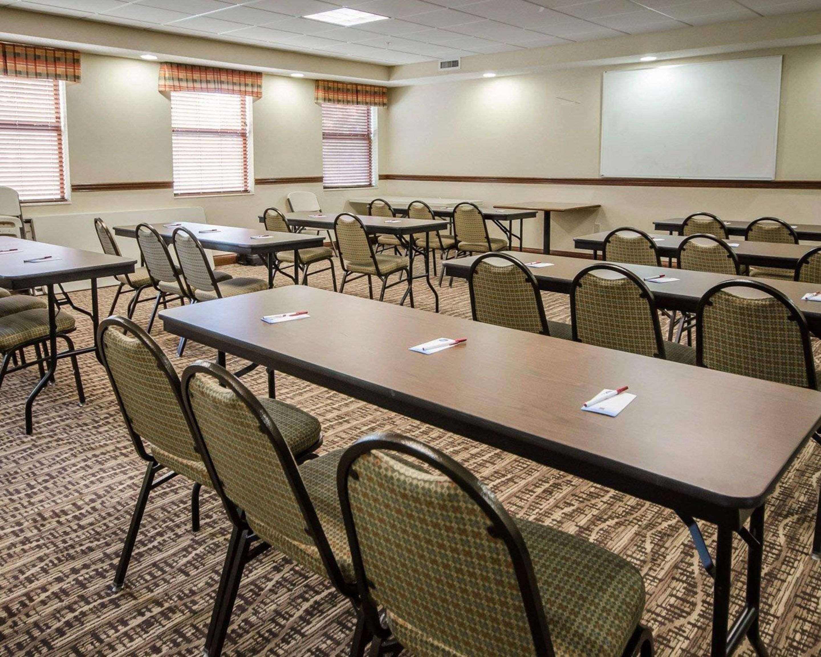 Meeting room with classroom-style setup | Quality Suites Jeffersonville - Louisville North