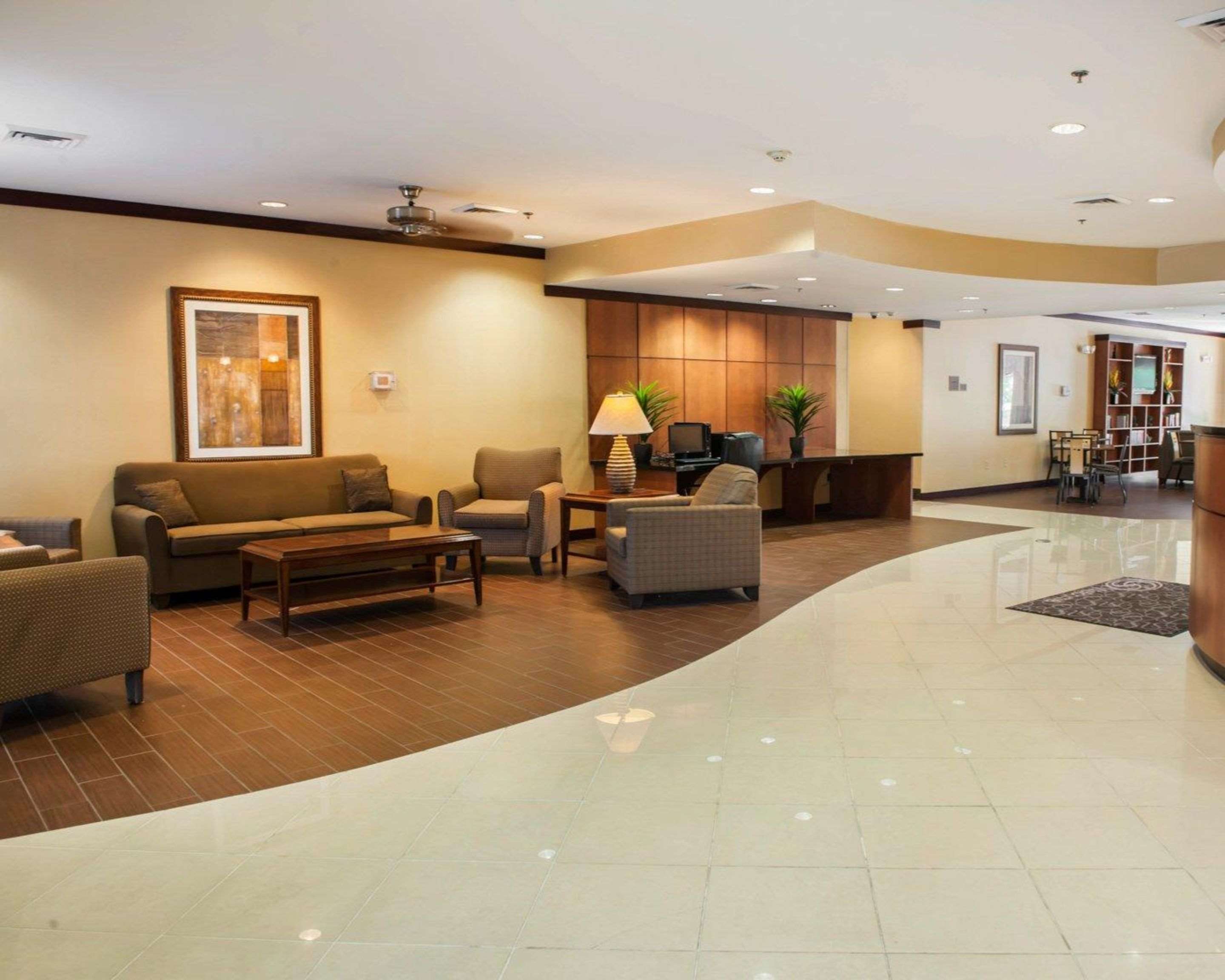 Spacious lobby with sitting area | Comfort Suites Southport