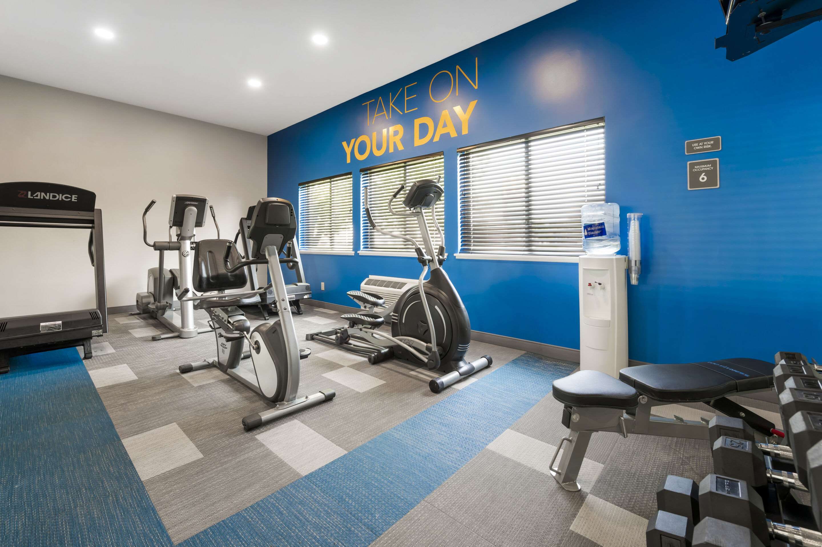 Exercise room with cardio equipment