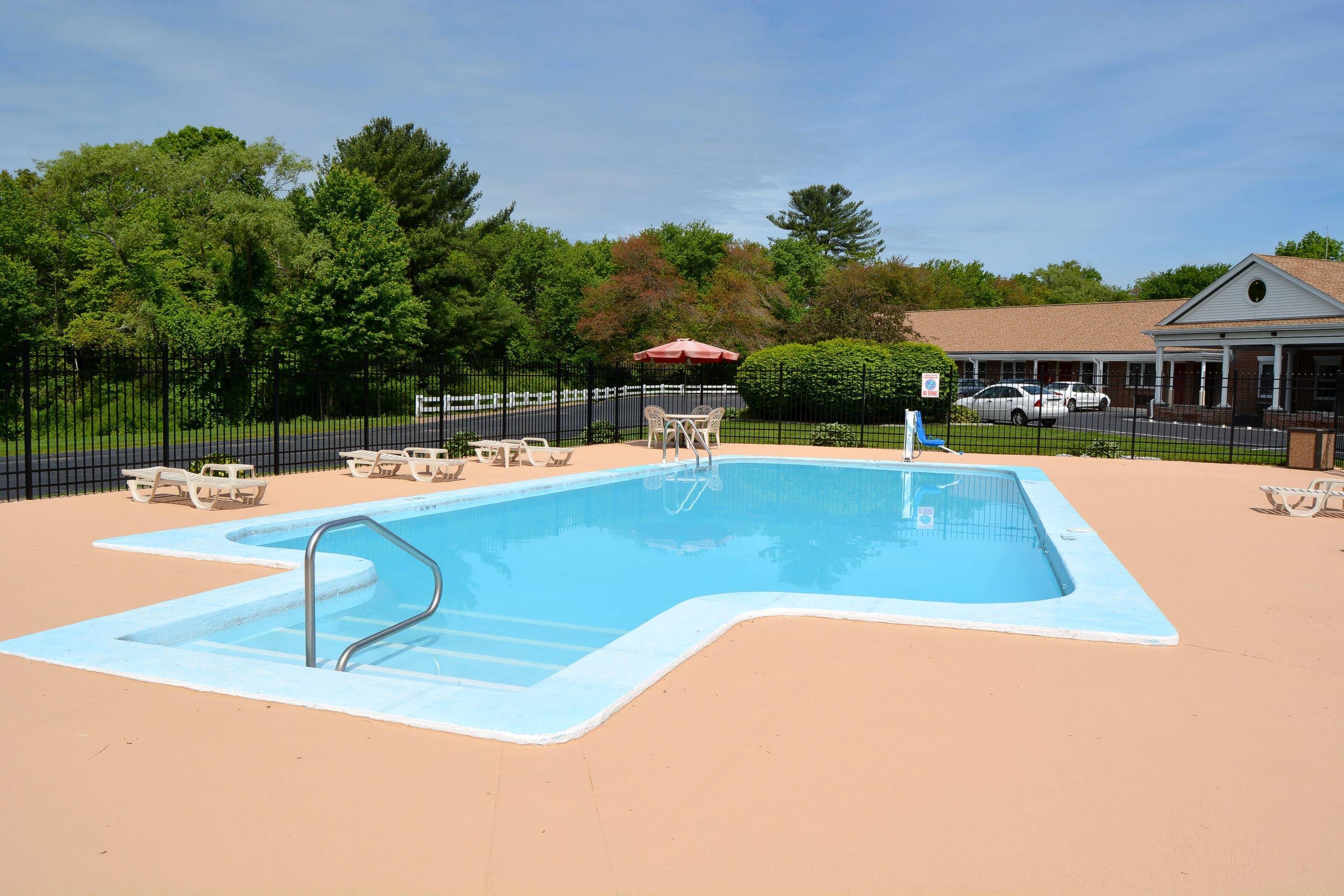 Outdoor pool | Quality Inn Raynham - Taunton