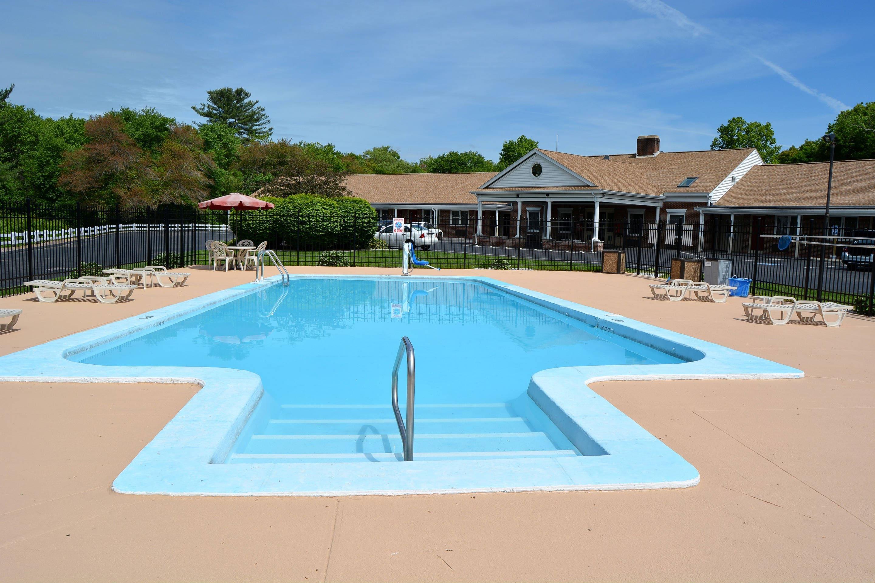 Outdoor pool | Quality Inn Raynham - Taunton