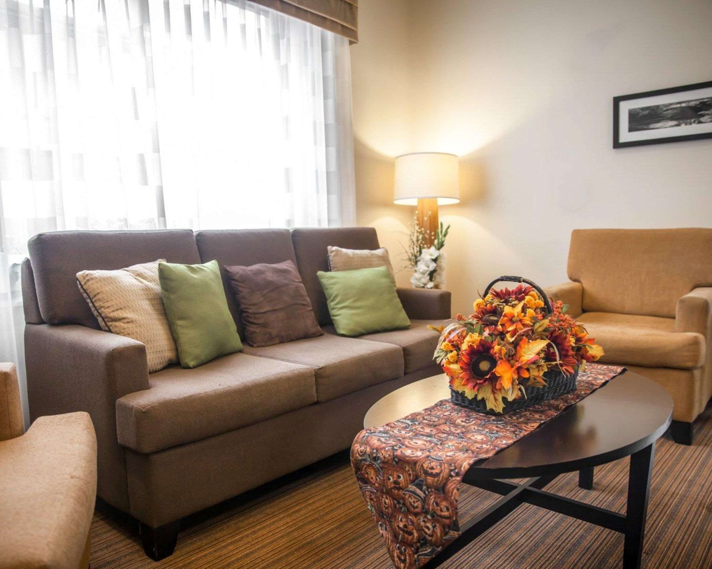 Spacious lobby with sitting area | Sleep Inn & Suites